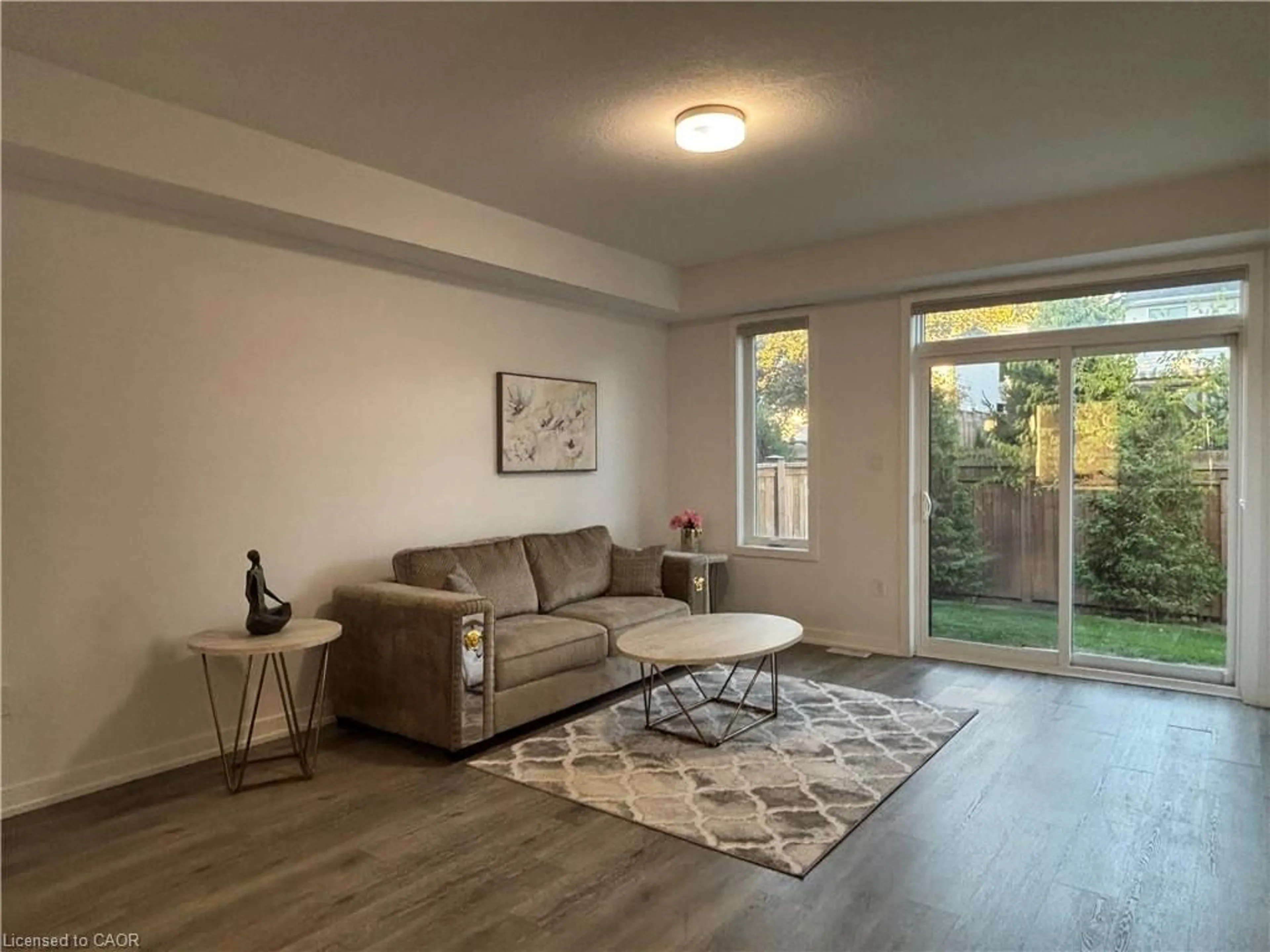 Living room with furniture, wood/laminate floor for 350 River Rd #41, Cambridge Ontario N3C 2B7