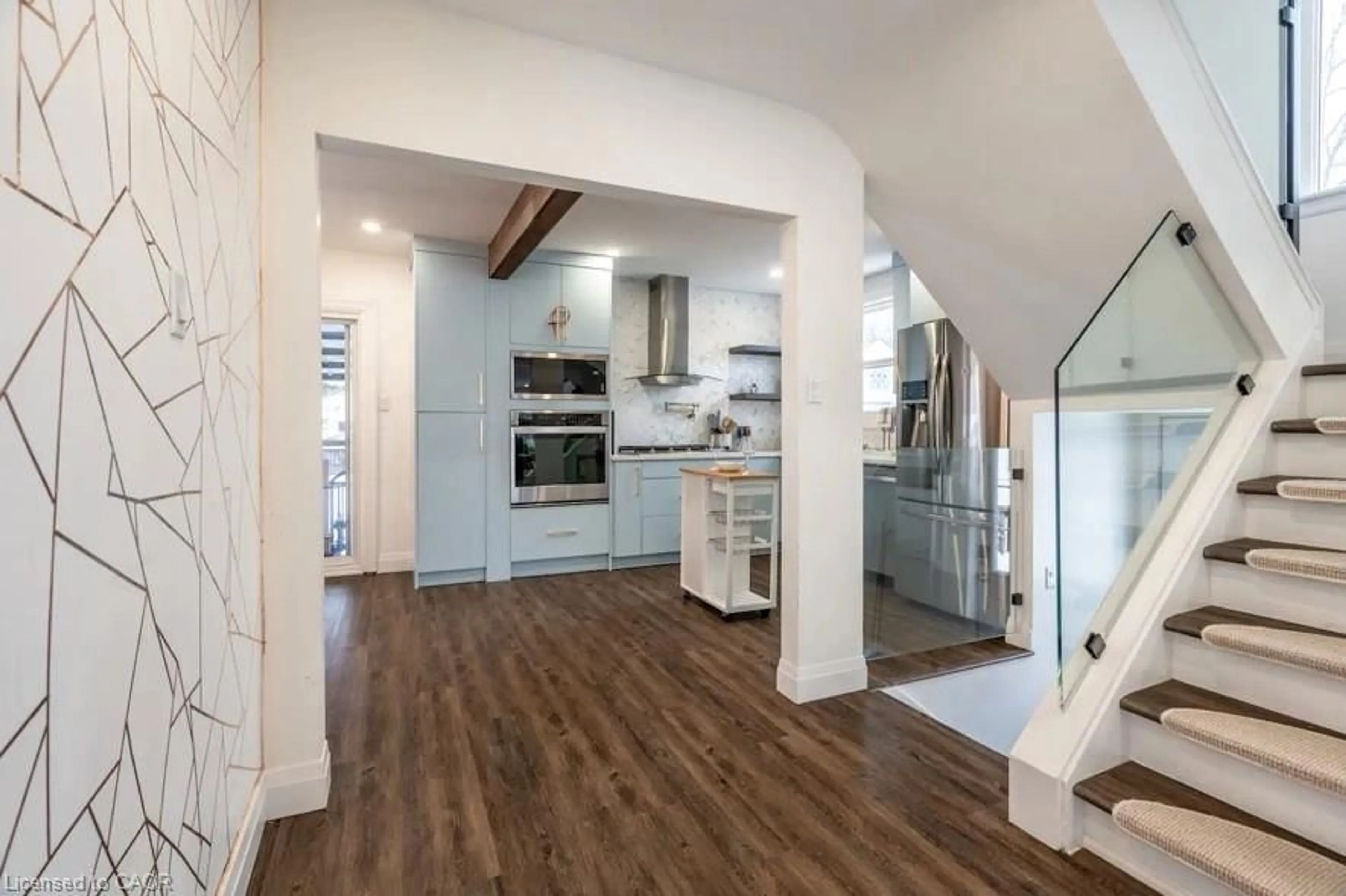 Open concept kitchen, wood/laminate floor for 122 Queensdale Ave, Hamilton Ontario L9A 1K3