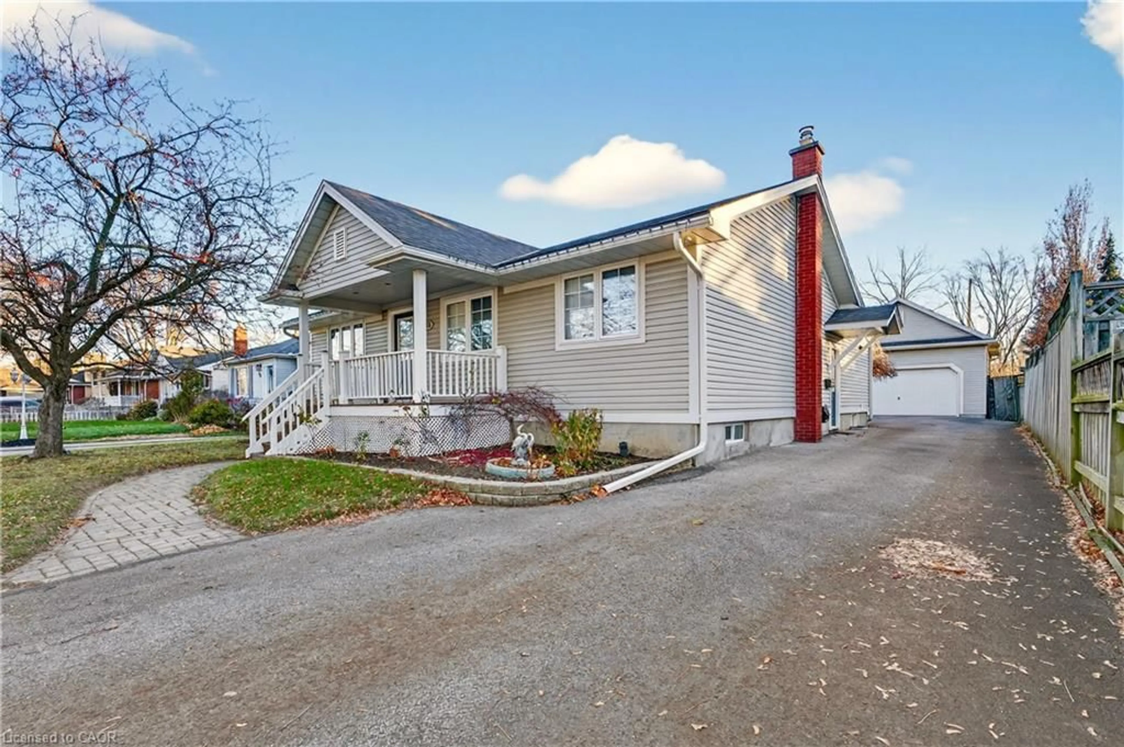 Home with vinyl exterior material, street for 56 Dunkeld Ave, St. Catharines Ontario L2M 4A7