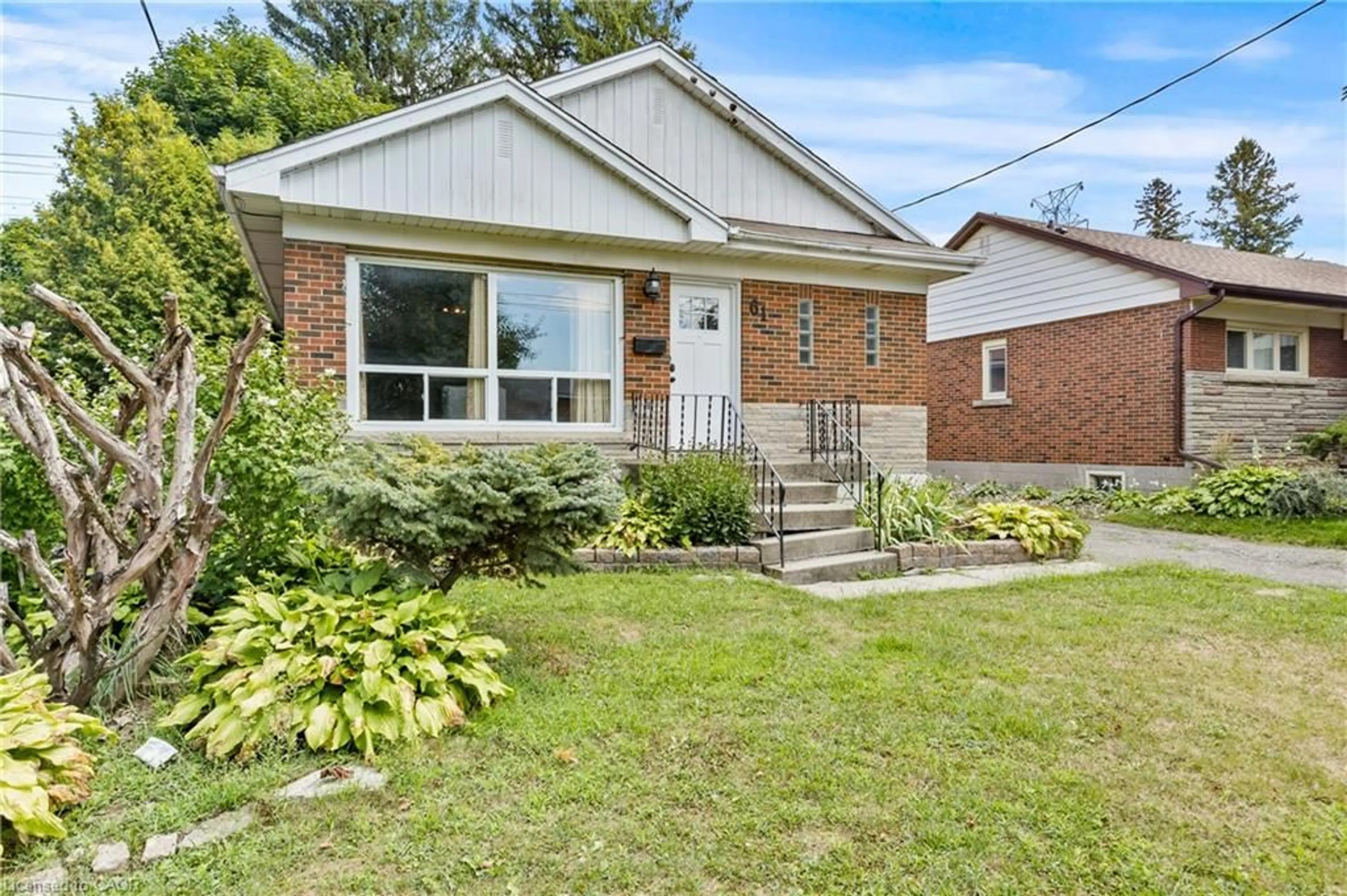 Home with brick exterior material, street for 61 Radford St, Hamilton Ontario L8S 3E5