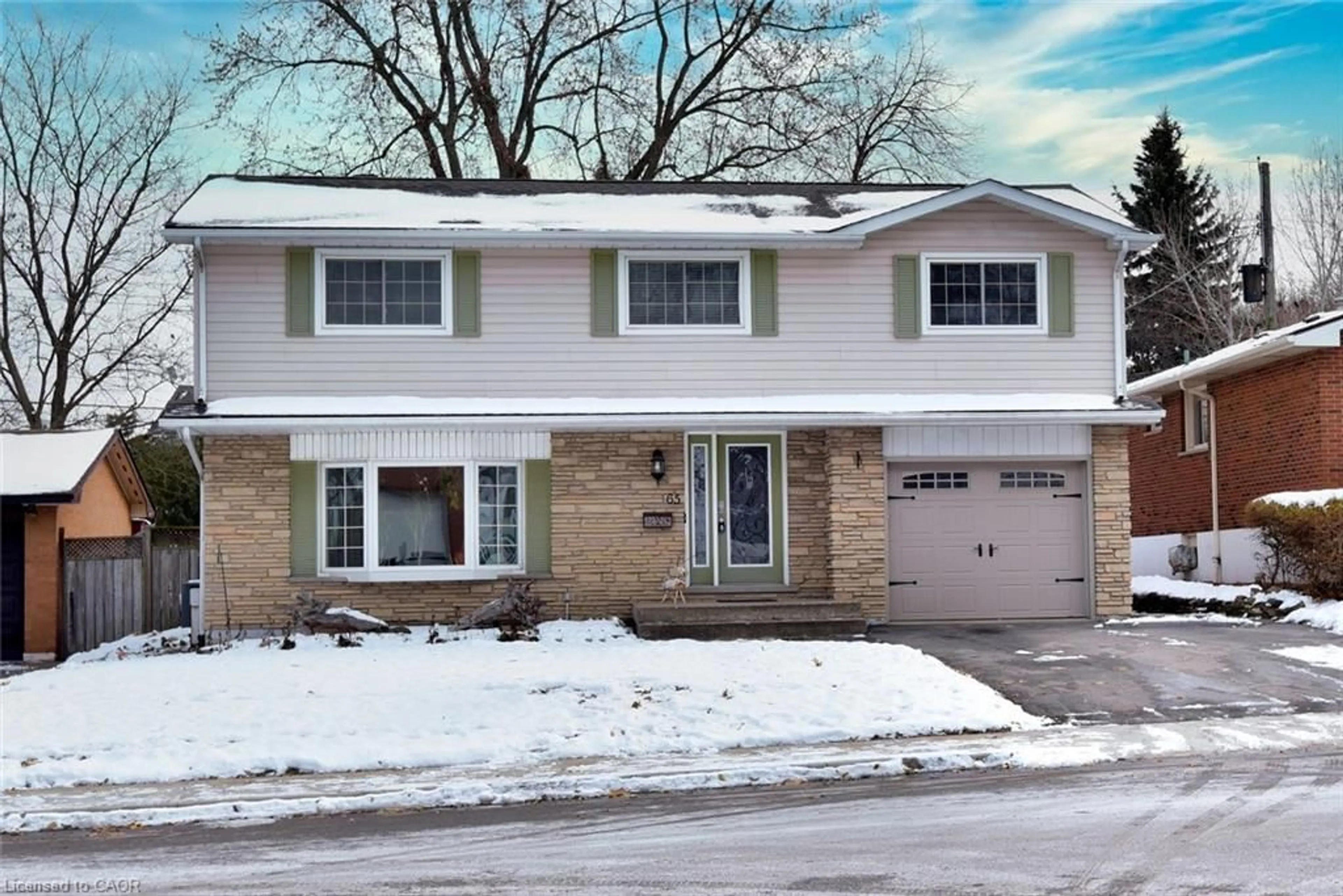 Home with brick exterior material, street for 65 Rolston Dr, Hamilton Ontario L9C 3X6