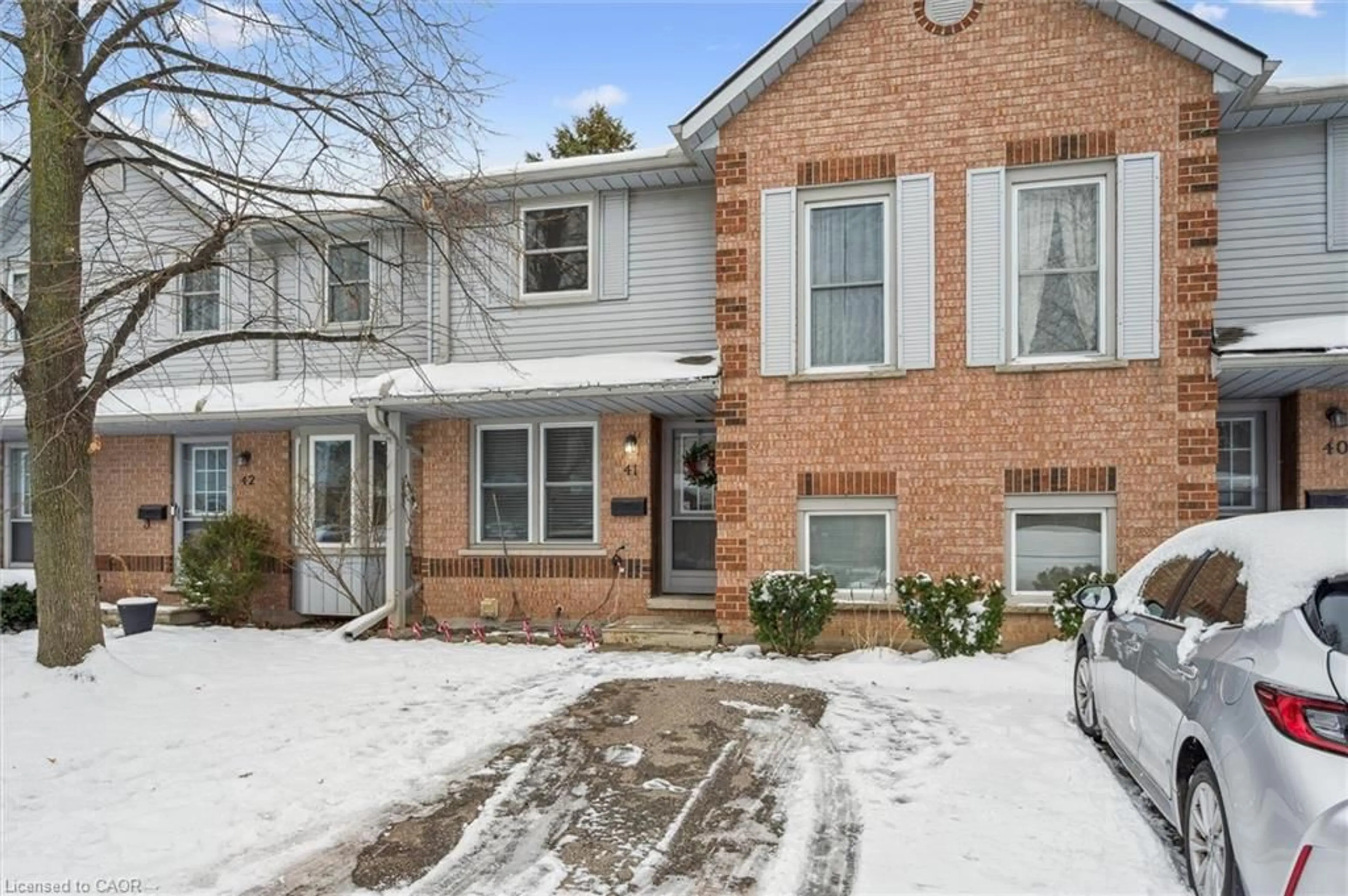Home with brick exterior material, street for 180 Marksam Rd #41, Guelph Ontario N1H 8G5