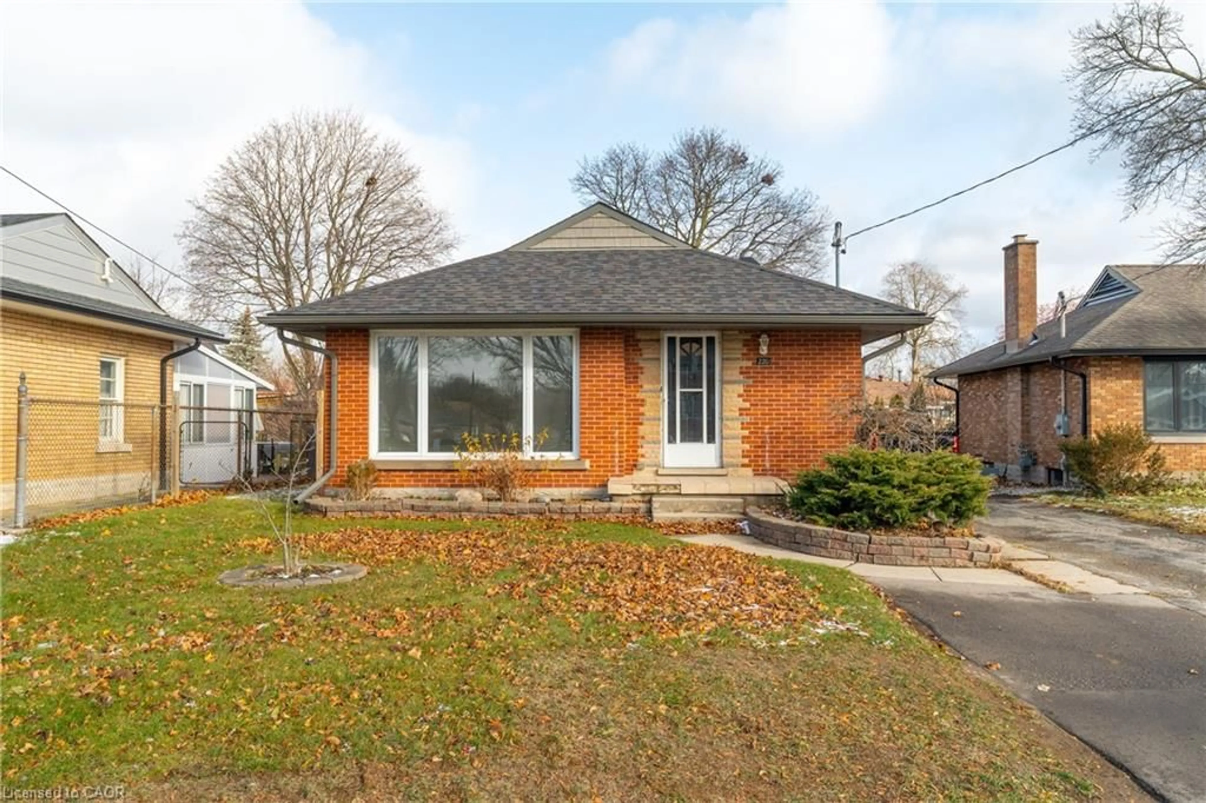 Home with brick exterior material, street for 220 Bruce St, Kitchener Ontario N2B 1Z3