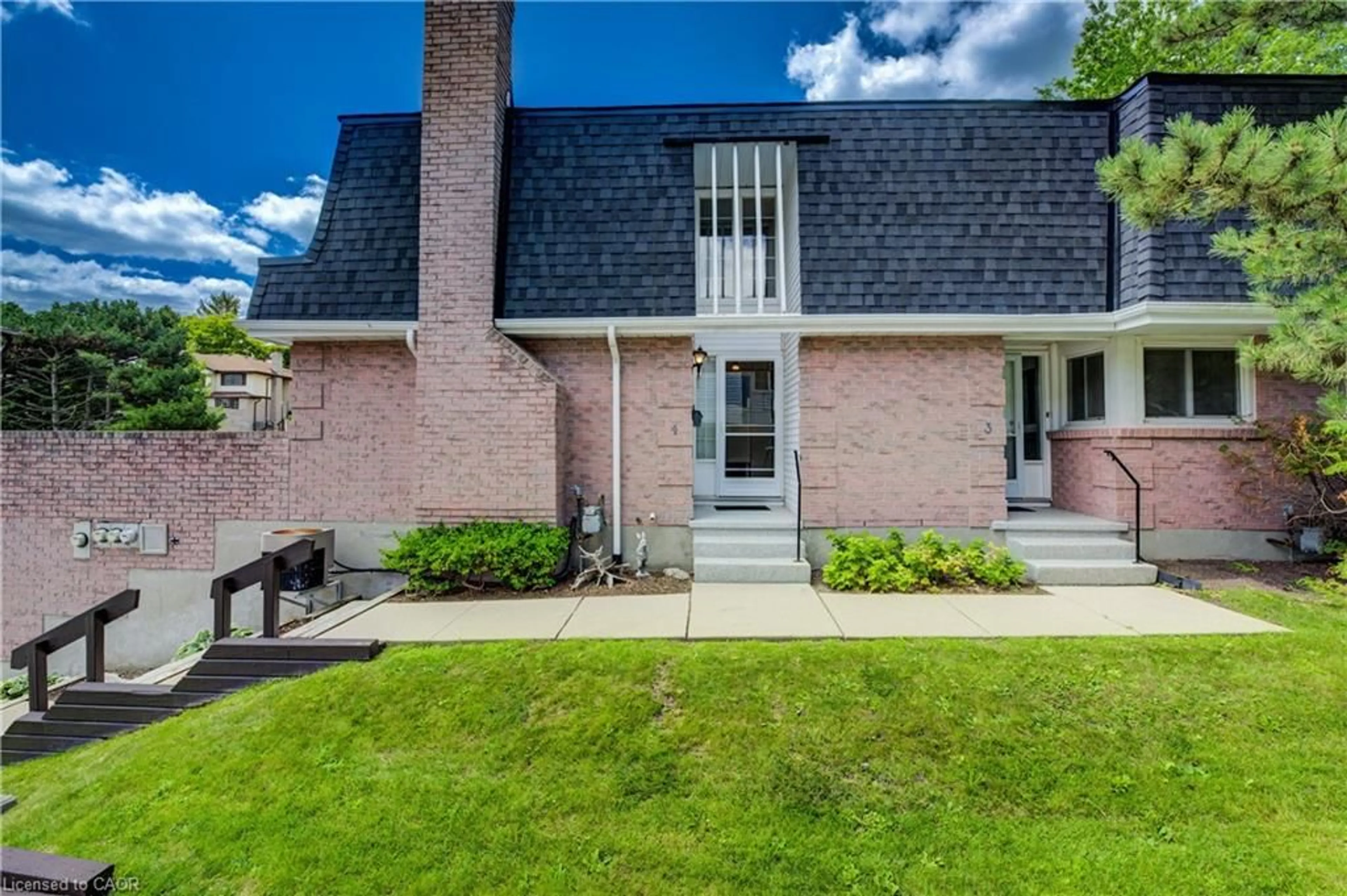 Home with brick exterior material, street for 493 Beechwood Dr #4, Waterloo Ontario N2T 1H8