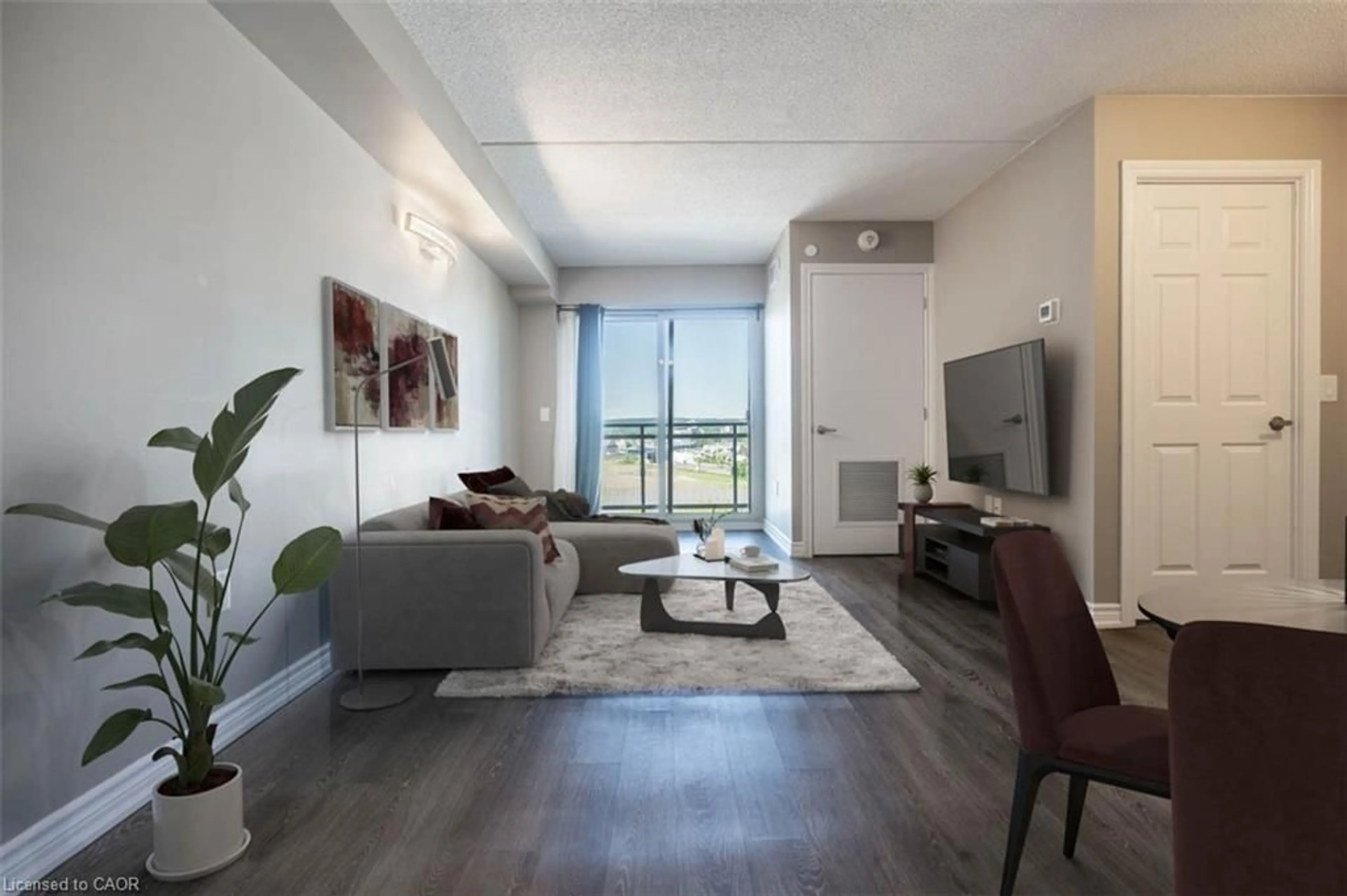 Living room with furniture, unknown for 716 Main St #509, Milton Ontario L9T 9L9