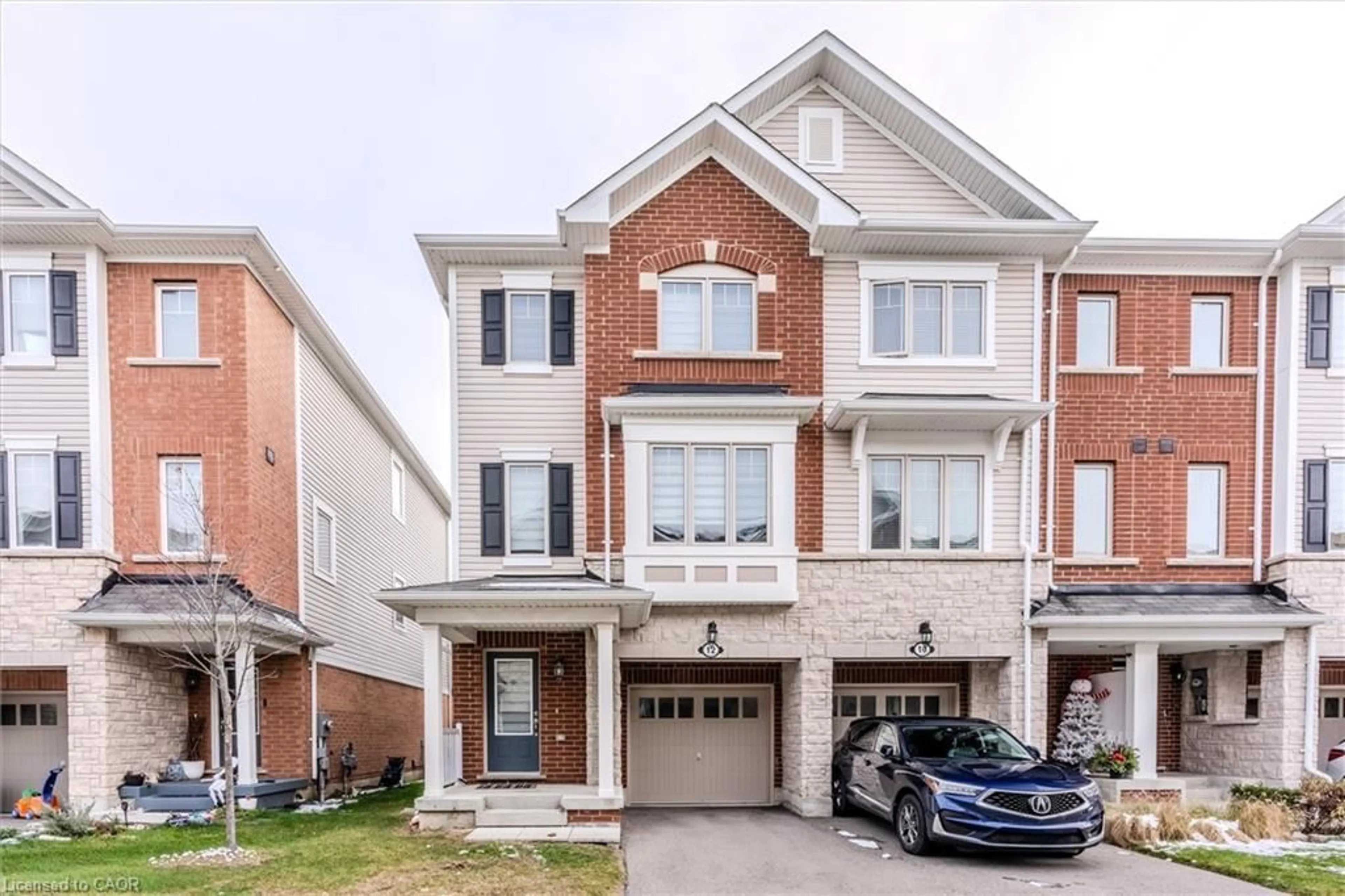 Home with brick exterior material, street for 12 Rapids Lane, Hamilton Ontario L8K 0A3