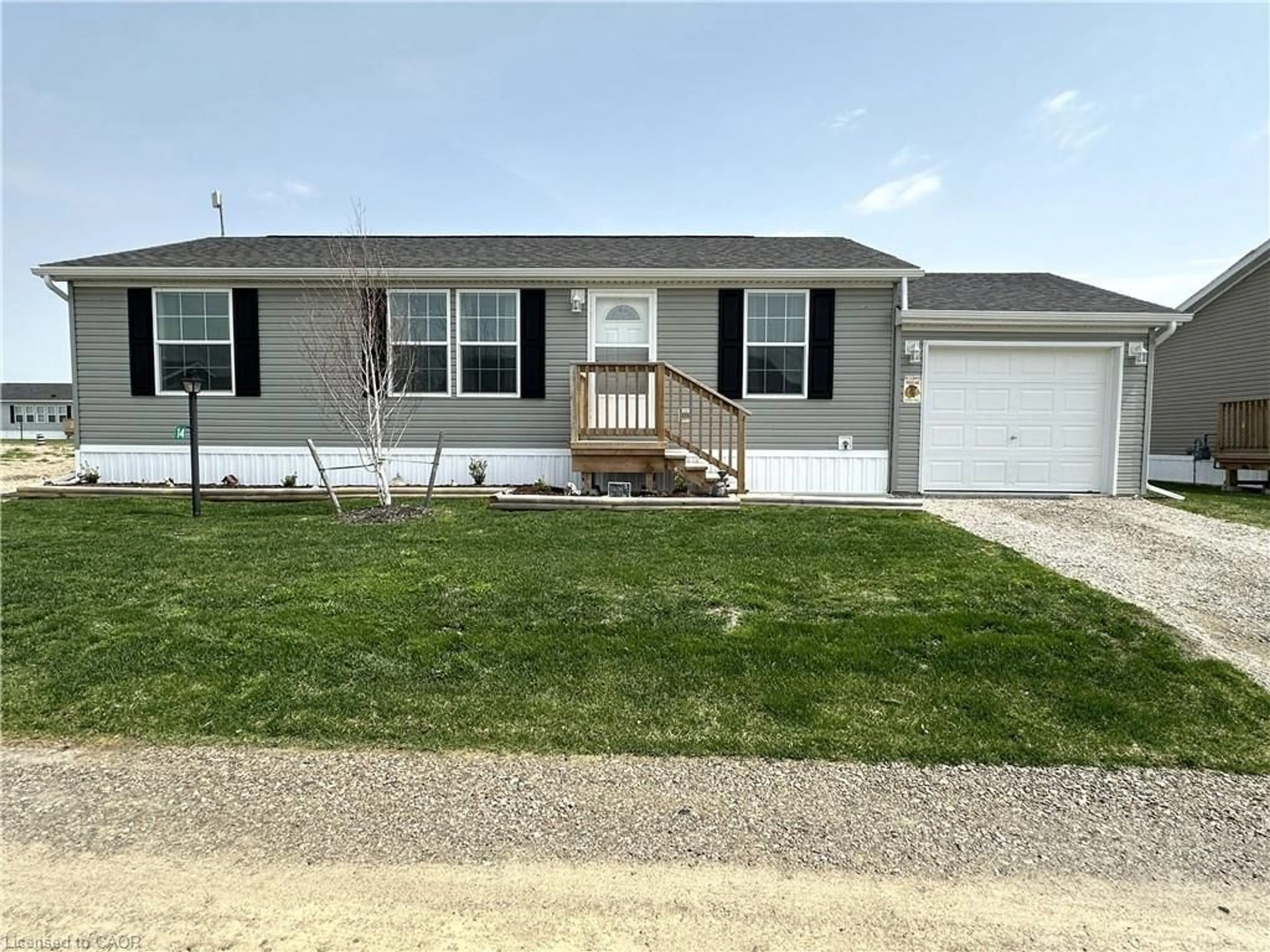 Home with vinyl exterior material, street for 14 Copper Beech Dr, Haldimand County Ontario N0A 1L0