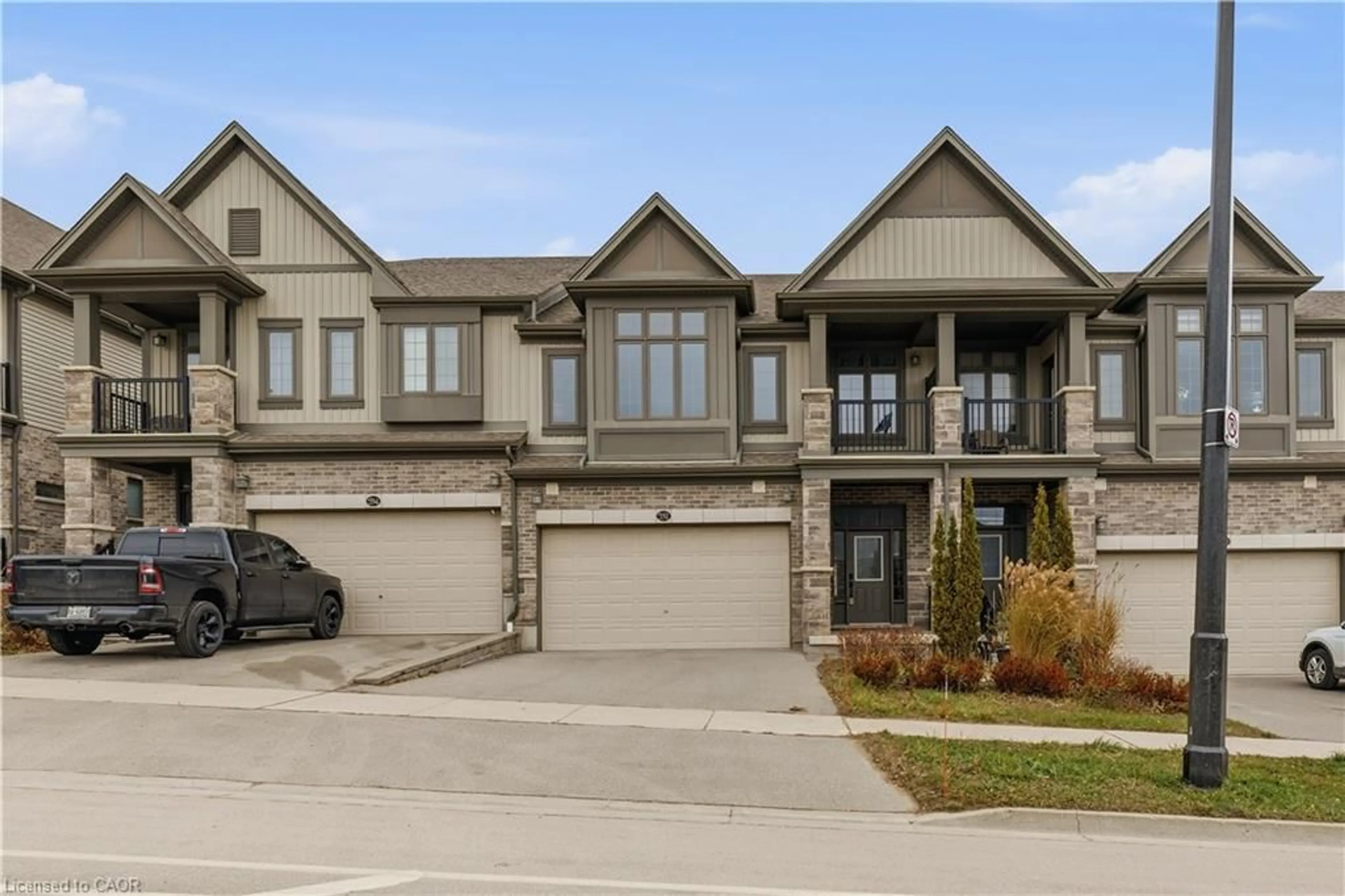 Home with brick exterior material, street for 592 Mayapple St, Waterloo Ontario N2V 0E3