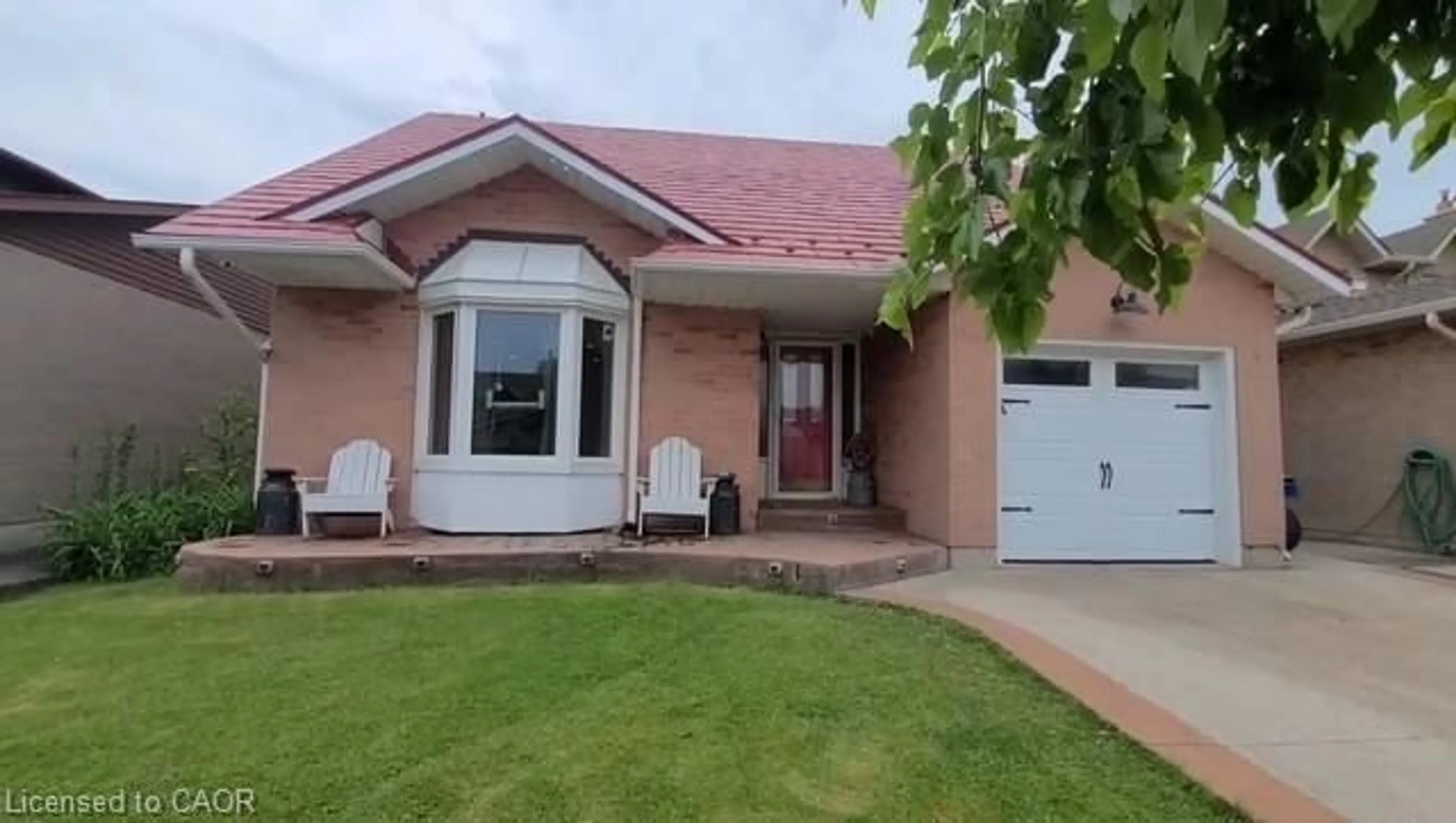 Home with brick exterior material, street for 448 Acadia Dr, Hamilton Ontario L8W 3A4