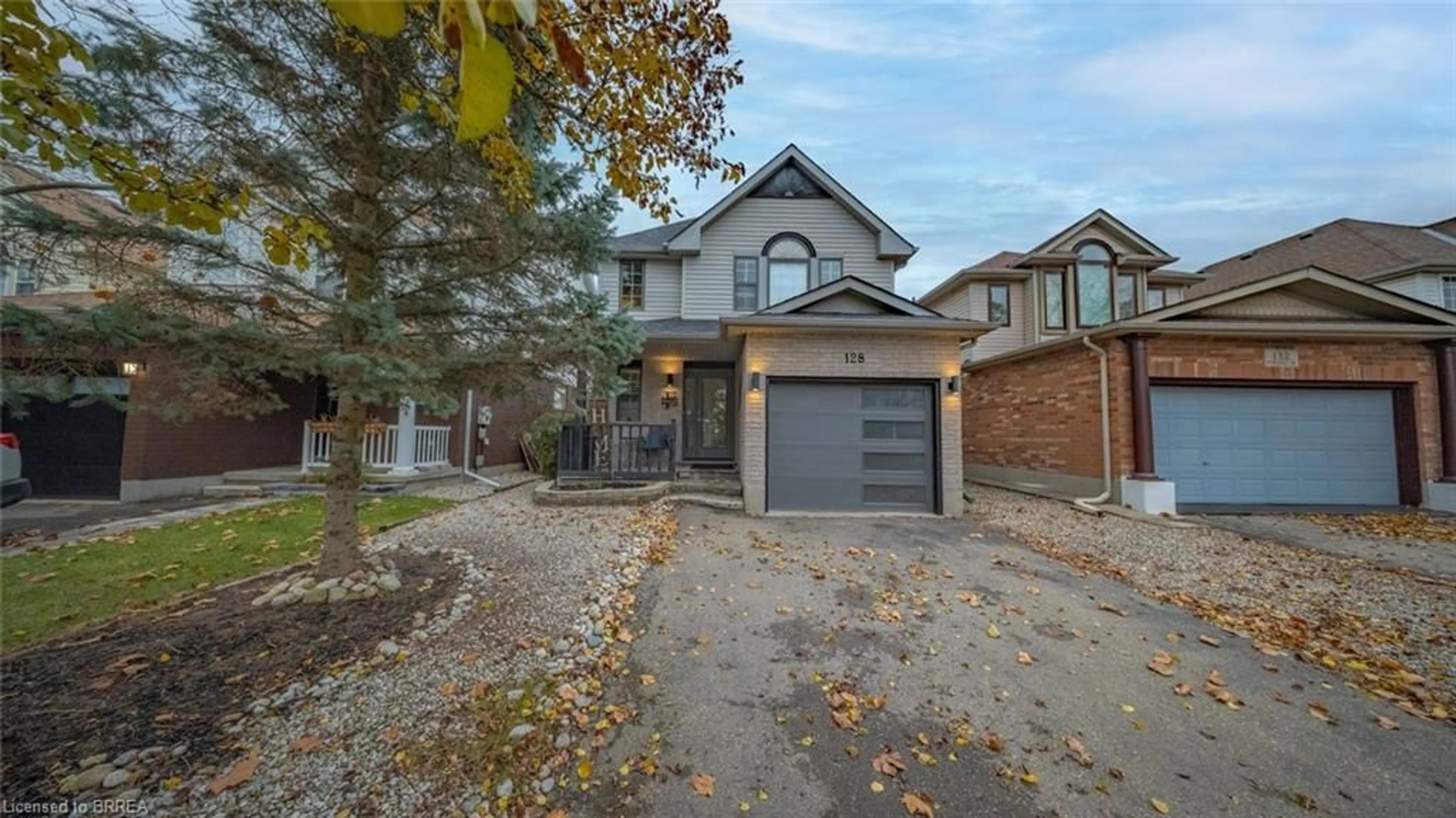 Home with brick exterior material, street for 128 Mcmeeken Dr, Cambridge Ontario N3C 4E7