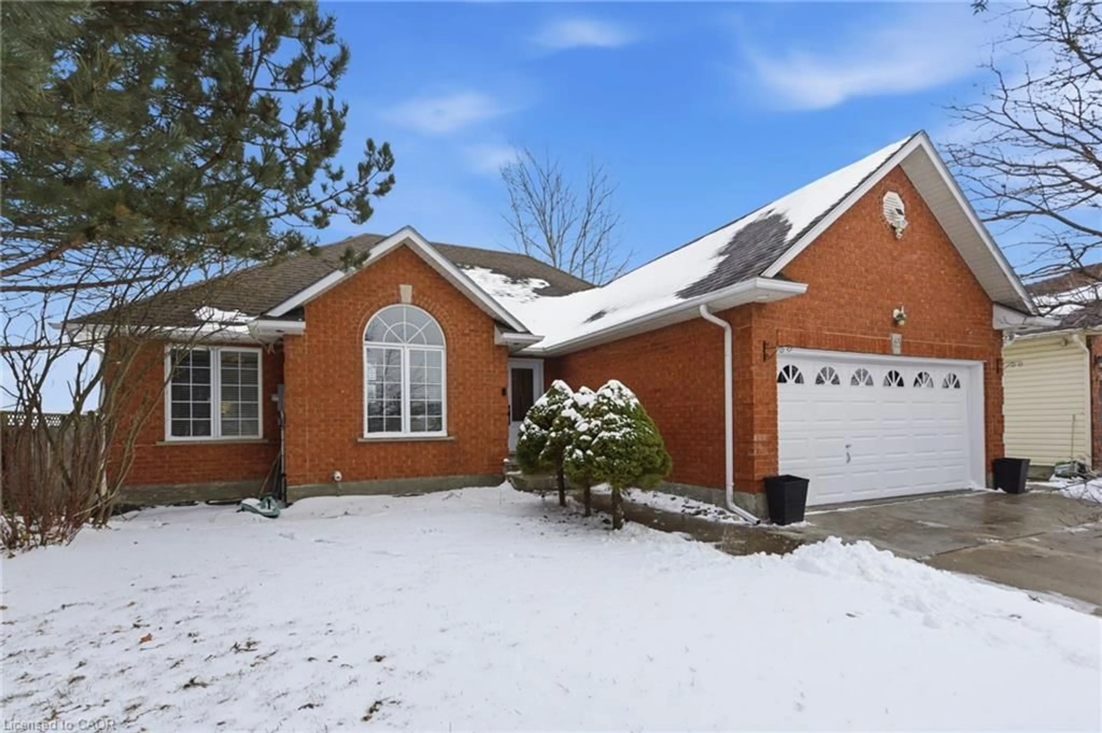 Home with brick exterior material, street for 65 Thistlemoor Dr, Caledonia Ontario N3W 2K5