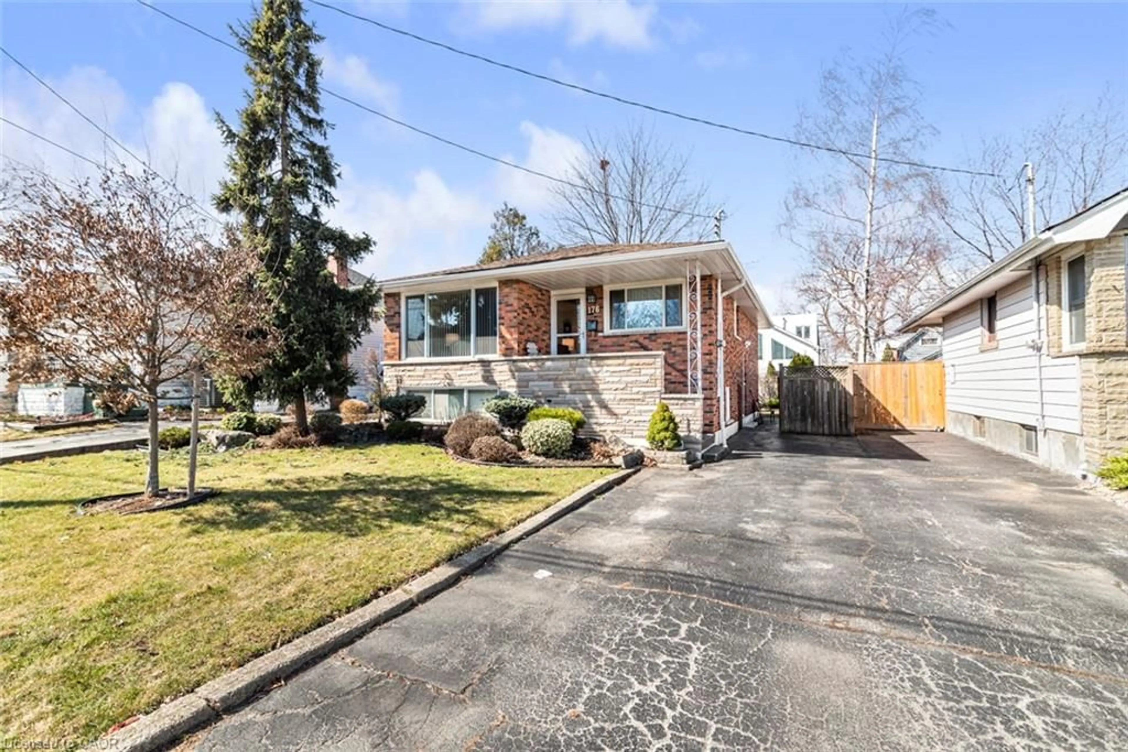 Home with brick exterior material, street for 176 Walter Ave, Hamilton Ontario L8K 3L2