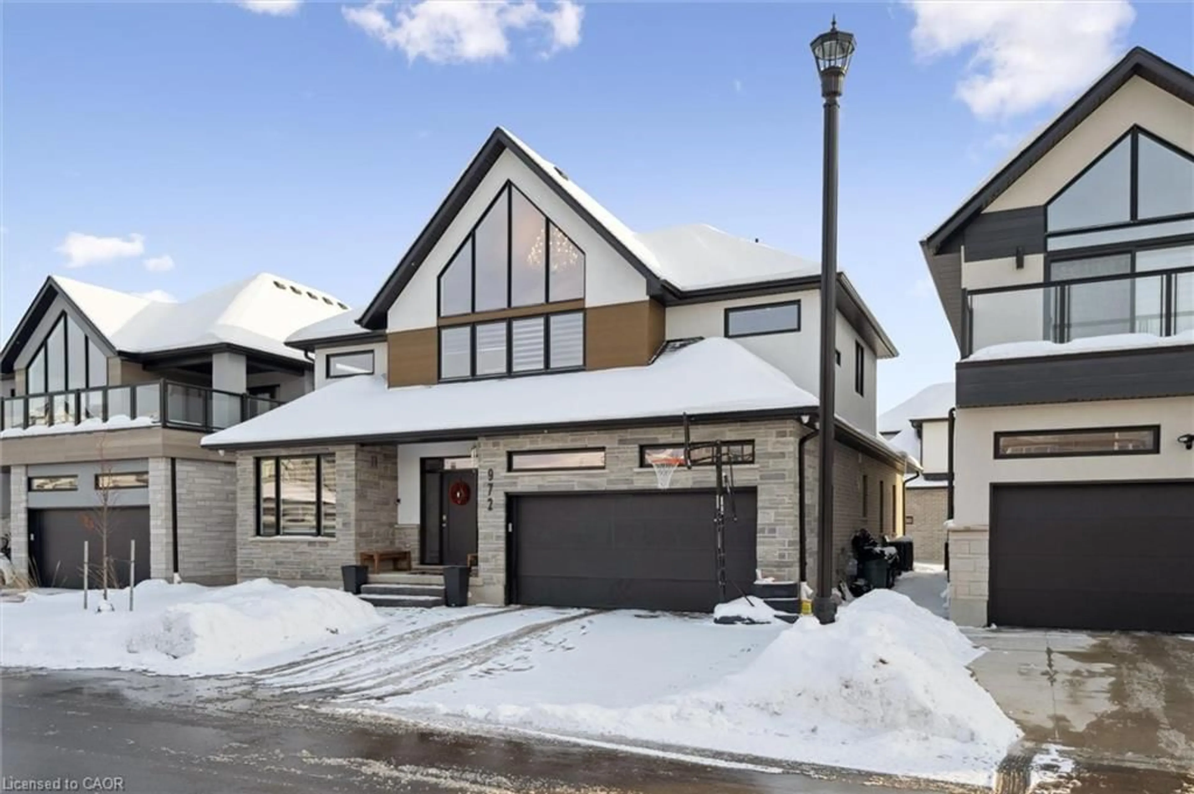 Home with brick exterior material, street for 972 Stonecliffe Walk #18, Kitchener Ontario N2P 0K5