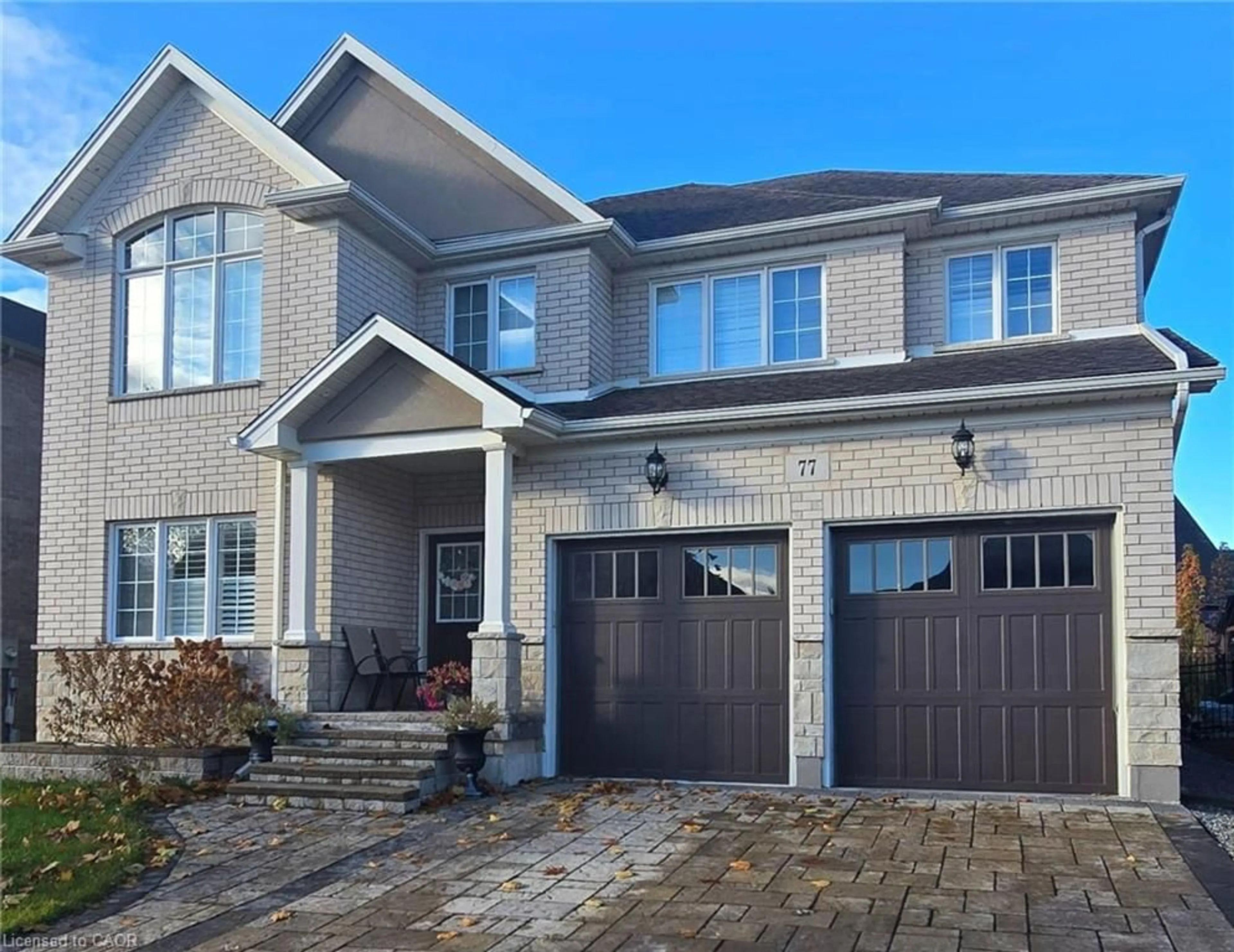 Home with brick exterior material, street for 77 Eaglecrest St, Kitchener Ontario N2K 4K1