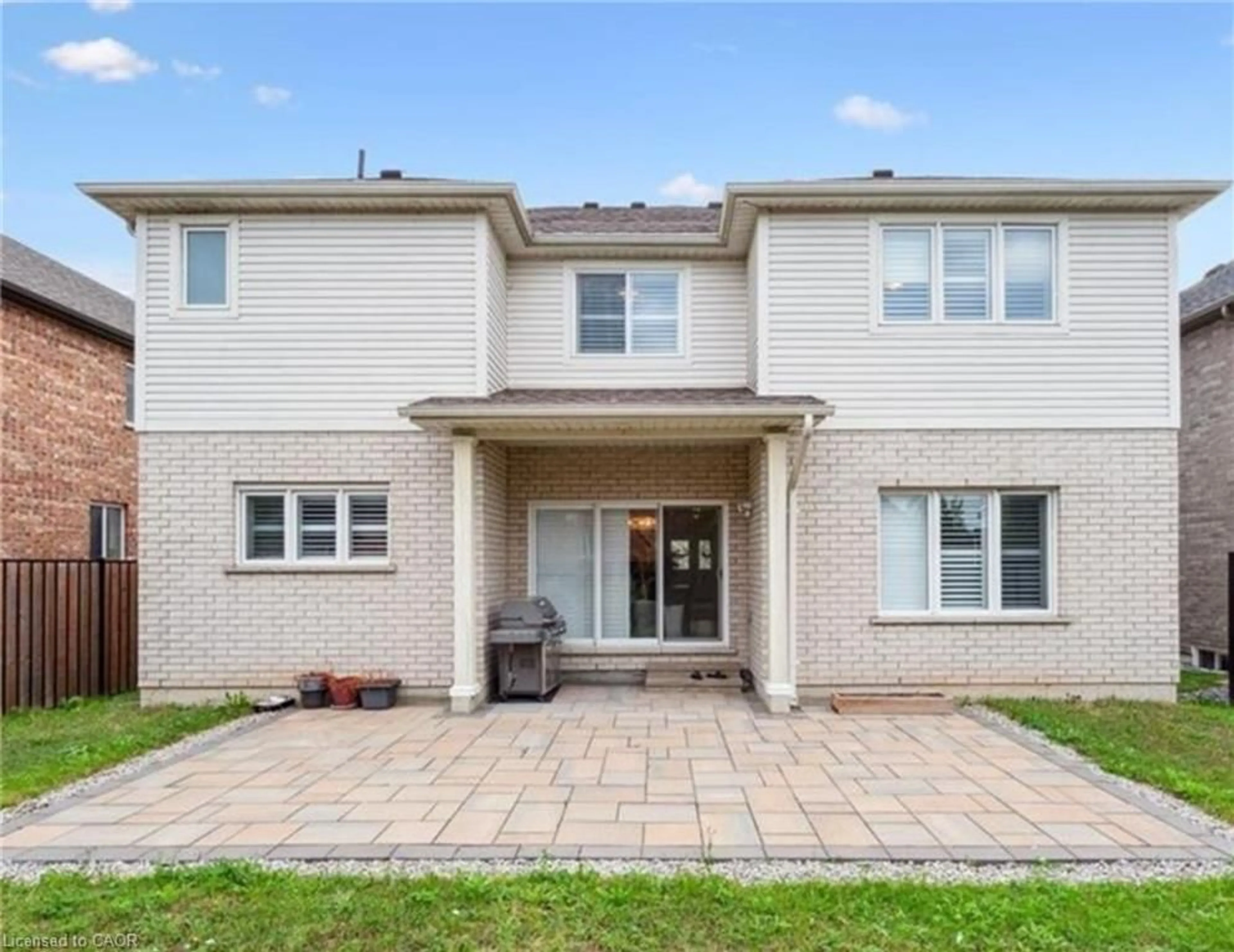 Home with brick exterior material, street for 77 Eaglecrest St, Kitchener Ontario N2K 4K1