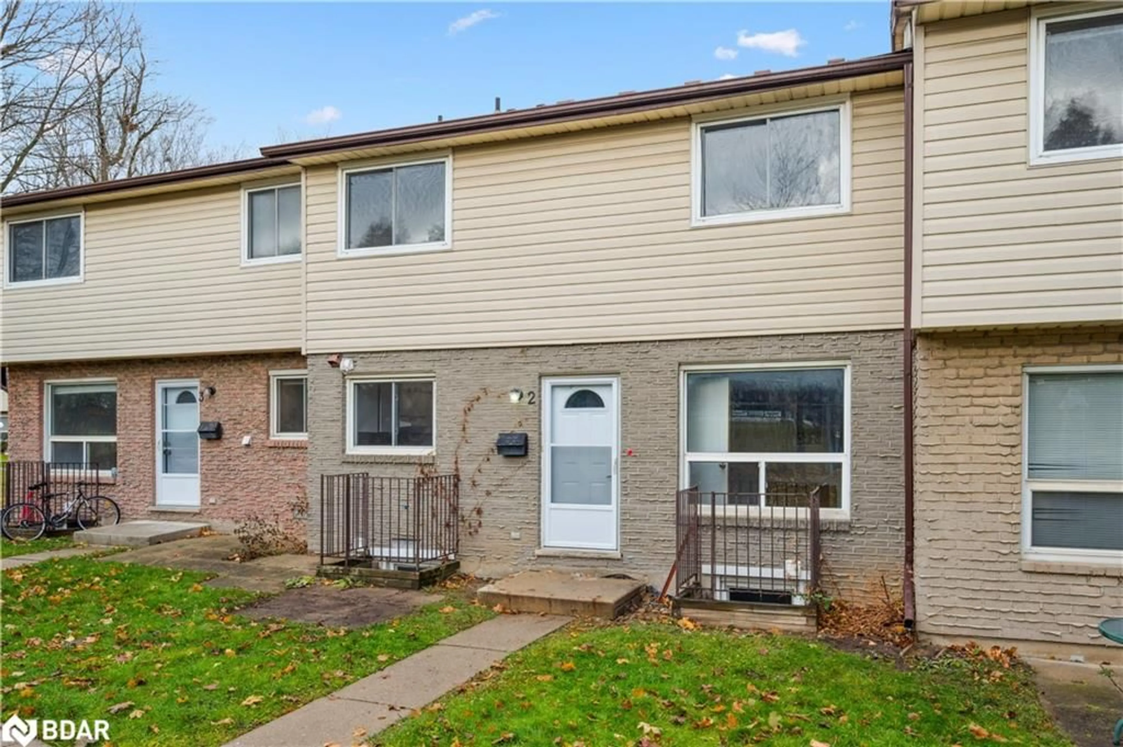 Home with vinyl exterior material, street for 455 Albert St #2, Waterloo Ontario N2L 5A7