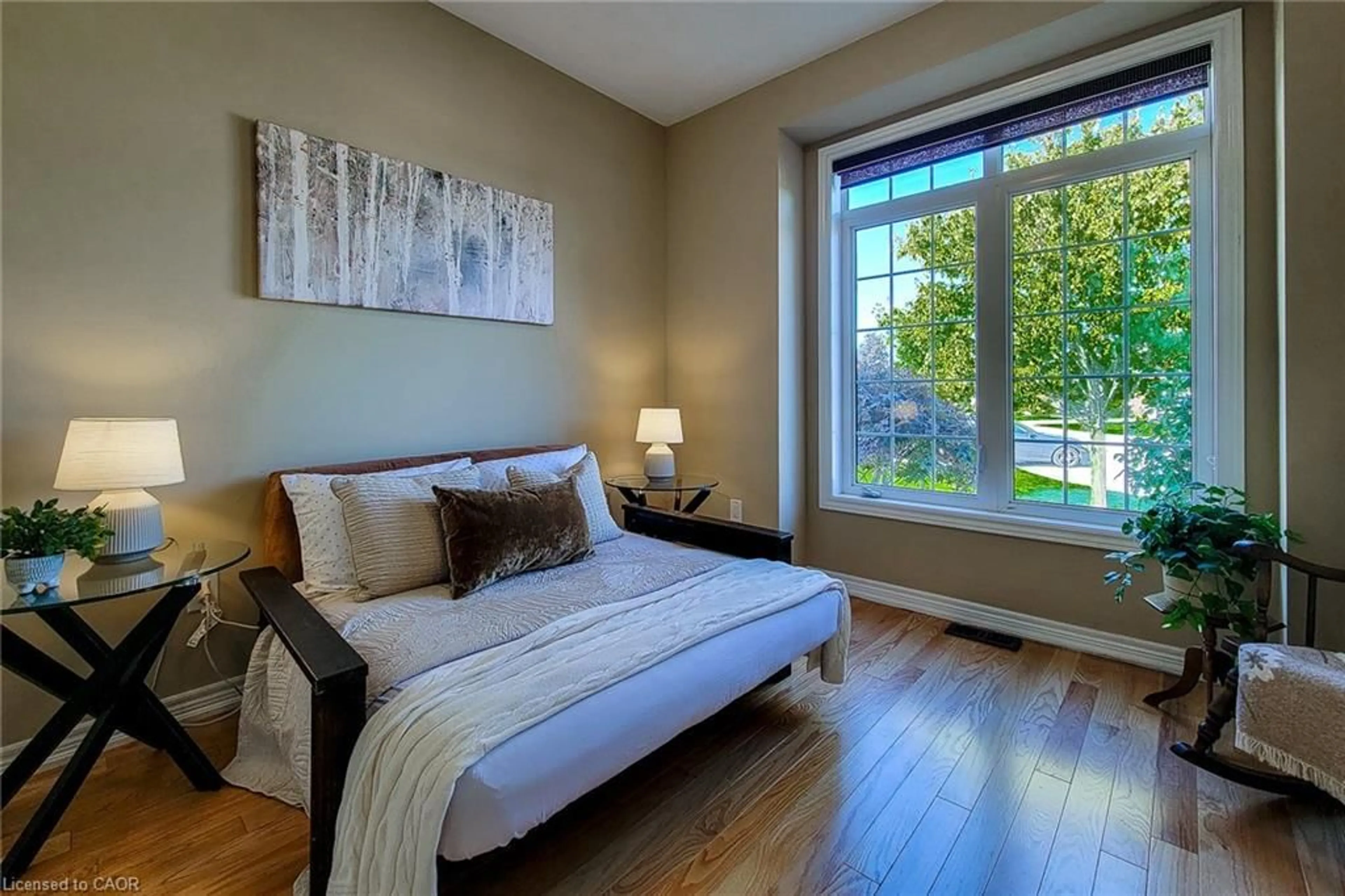 Bedroom with bed, wood/laminate floor for 115 Turnberry Trail, Welland Ontario L3B 0B7