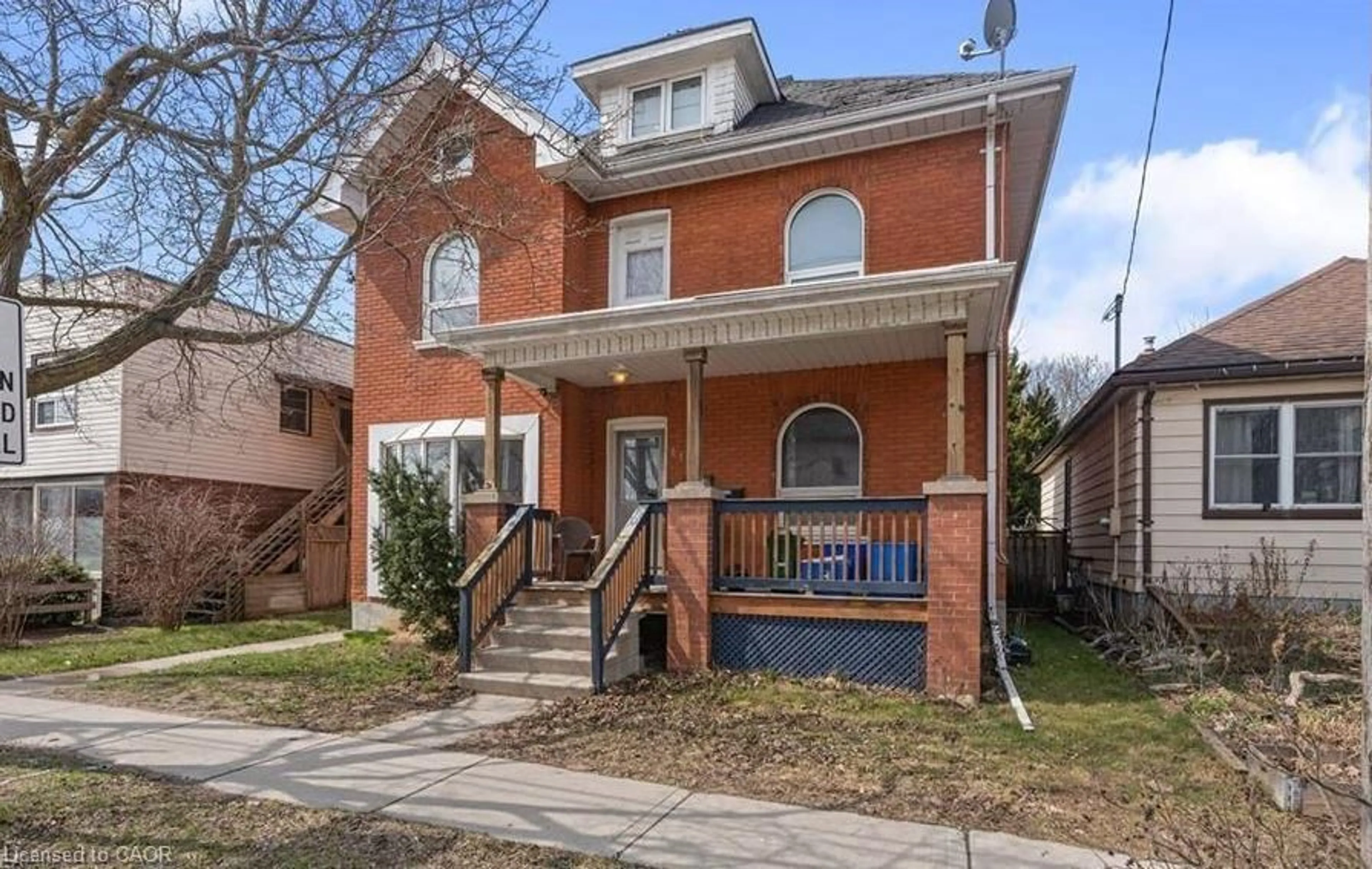 Home with brick exterior material, street for 219 Erie Ave, Brantford Ontario N3S 2H1