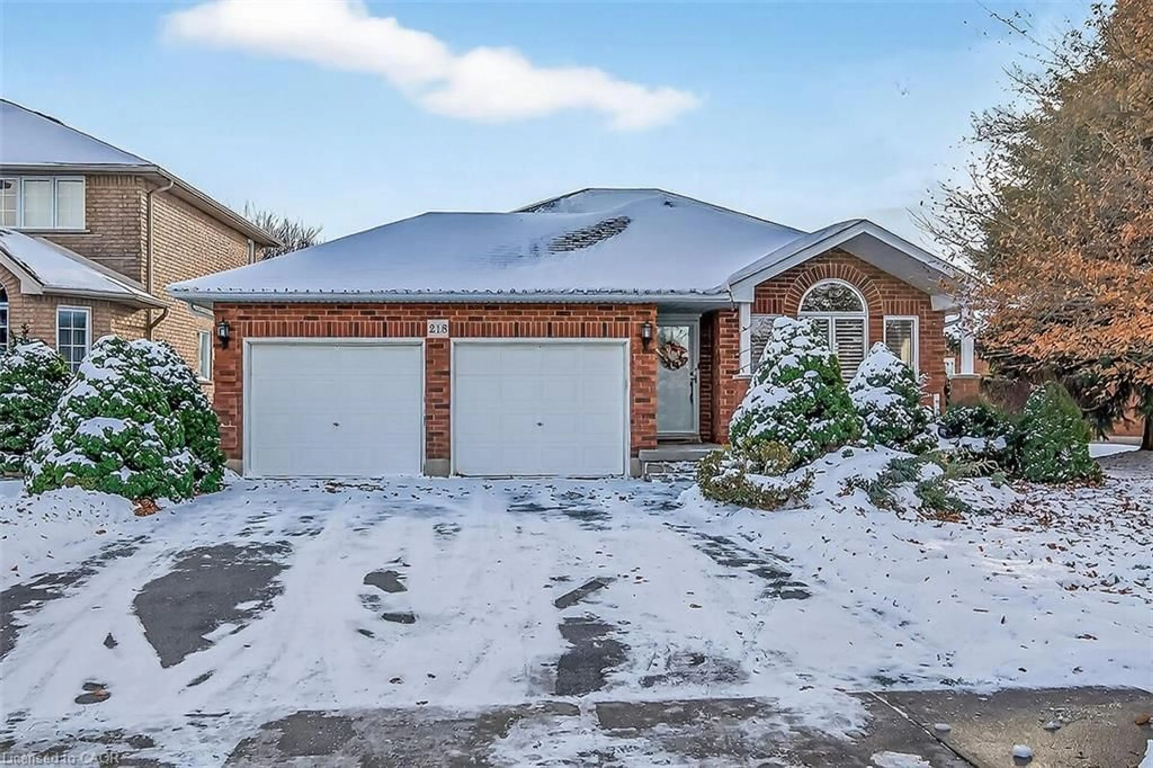 Home with brick exterior material, street for 218 Portage Lane, Mount Hope Ontario L0R 1W0