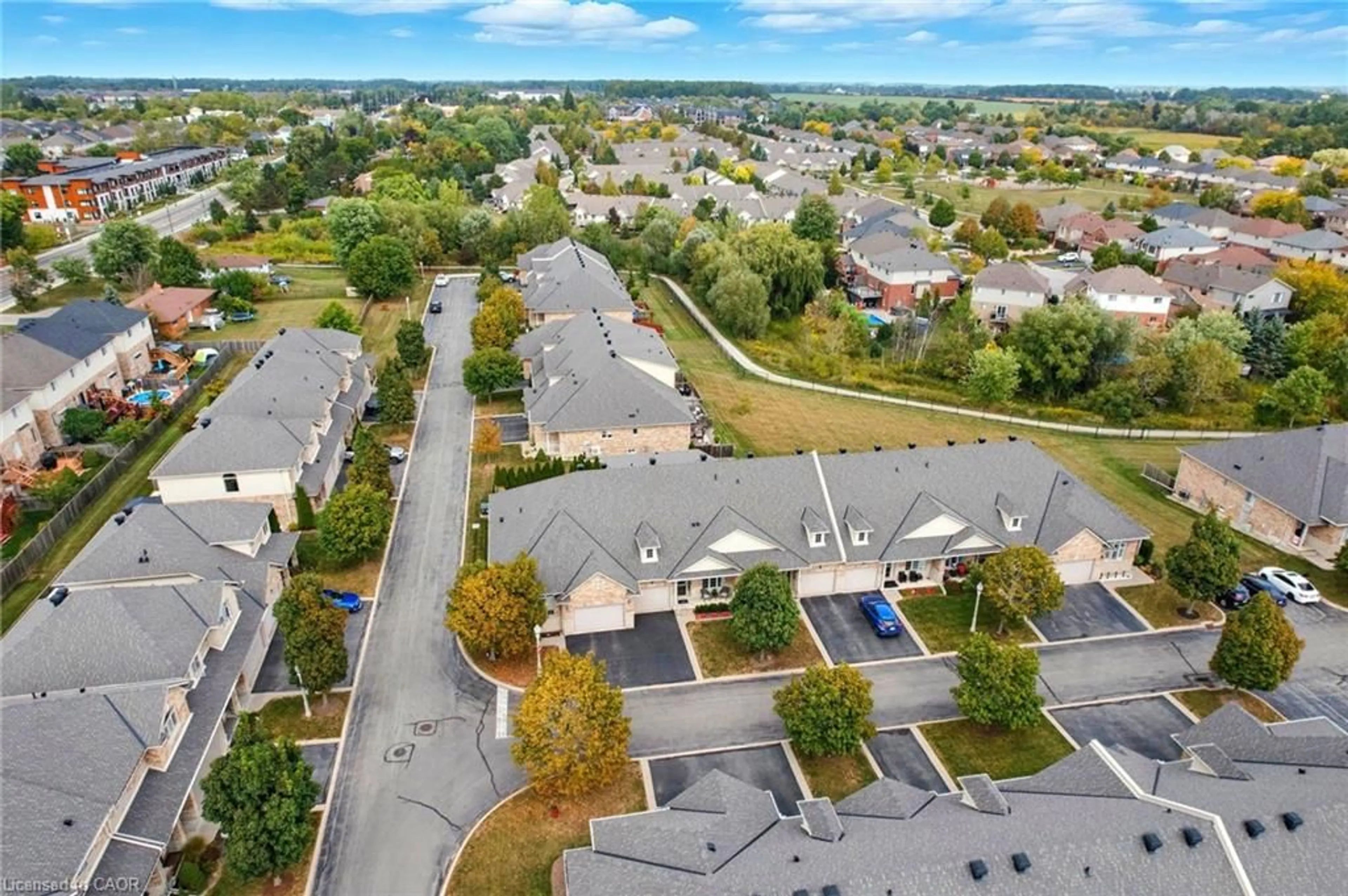 A pic from outside/outdoor area/front of a property/back of a property/a pic from drone, unknown for 310 Southbrook Dr #20, Binbrook Ontario L0R 1C0