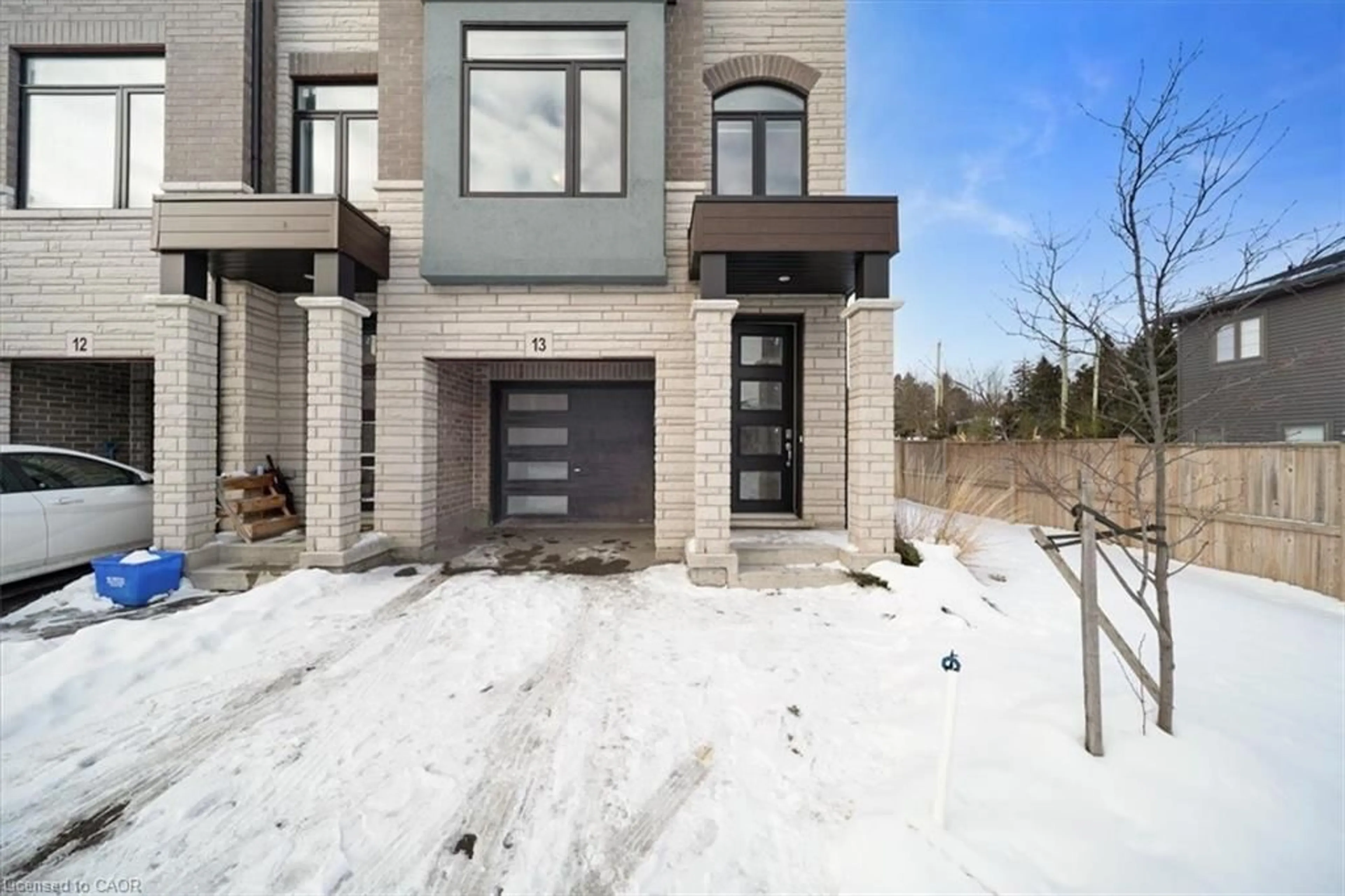 Home with brick exterior material, street for 314 Equestrian Way #13, Cambridge Ontario N3E 0E4