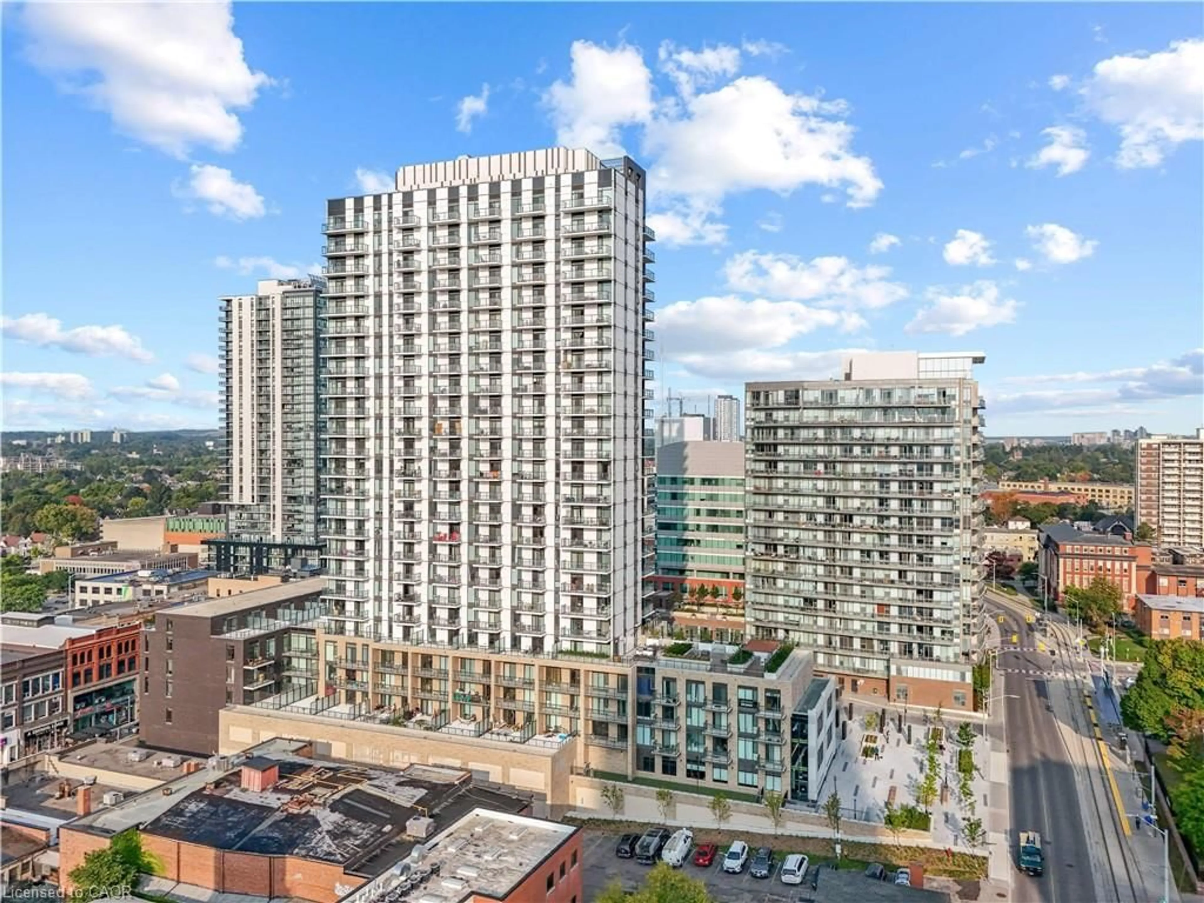 A pic from outside/outdoor area/front of a property/back of a property/a pic from drone, city buildings view from balcony for 55 Duke St #404, Kitchener Ontario N2H 0C9