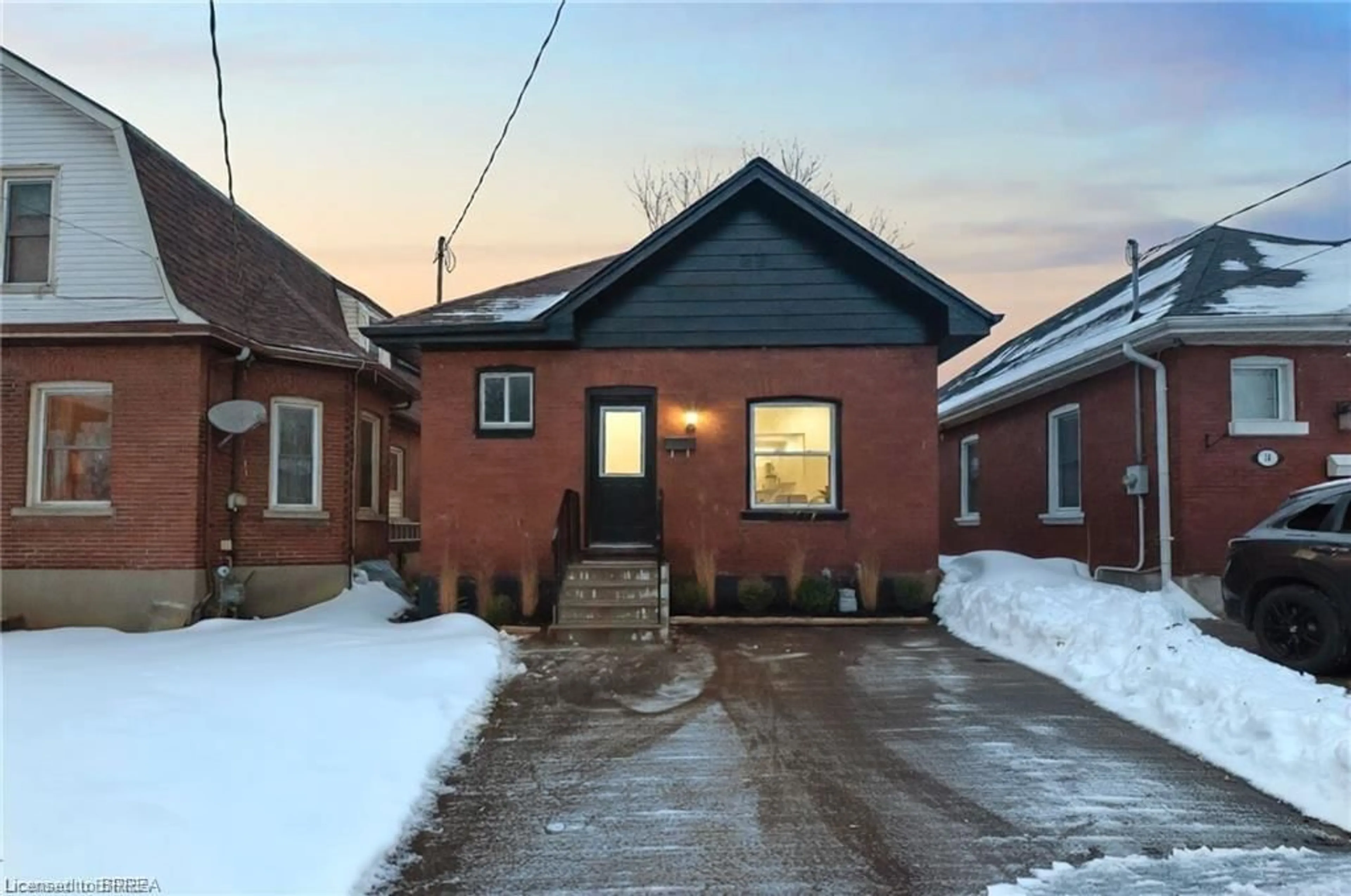 Home with brick exterior material, street for 12 Carlyle St, Brantford Ontario N3T 2C1