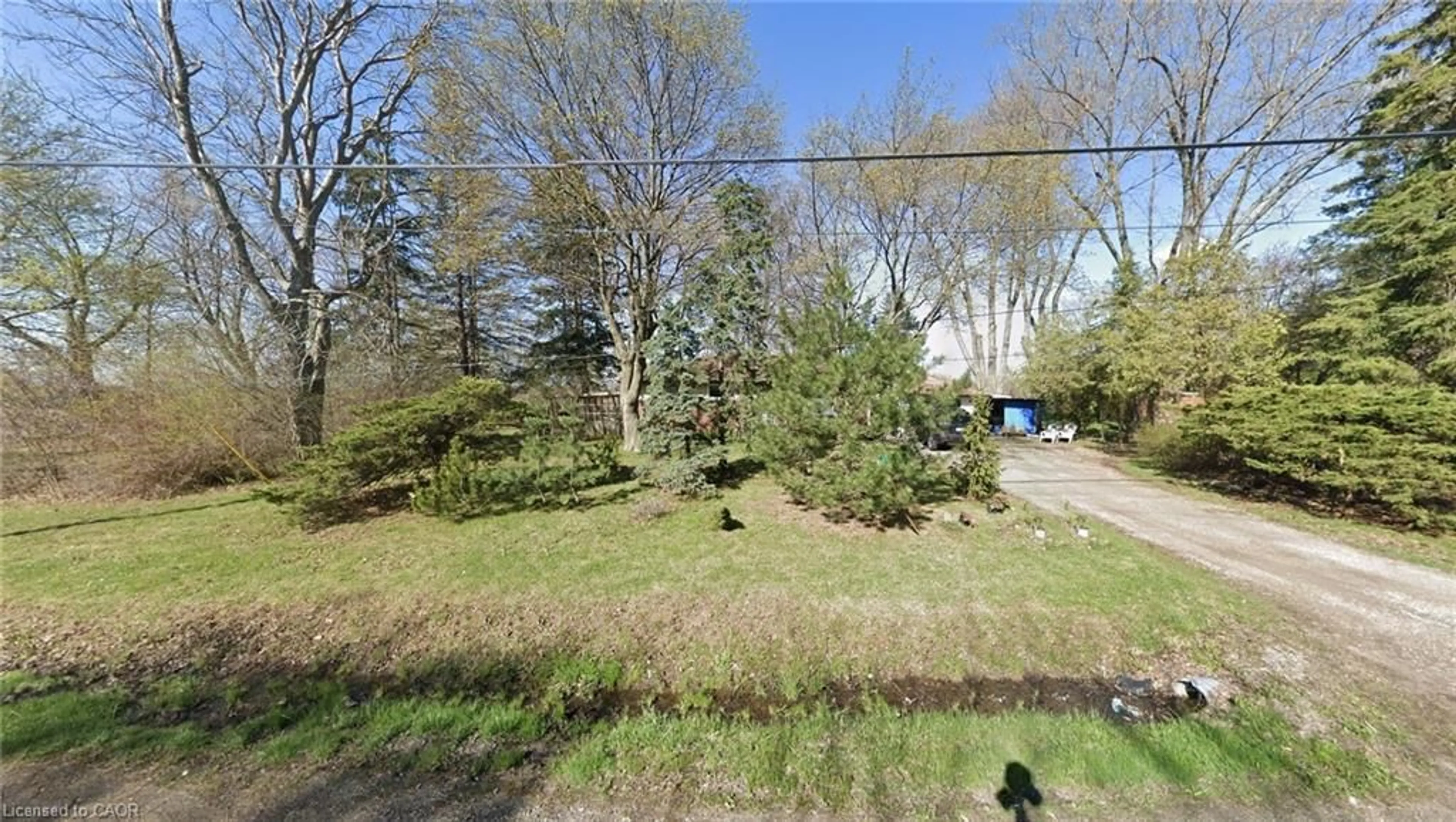 A pic from outside/outdoor area/front of a property/back of a property/a pic from drone, forest/trees view for 1084 Fiddlers Green Rd, Ancaster Ontario L9G 3R1