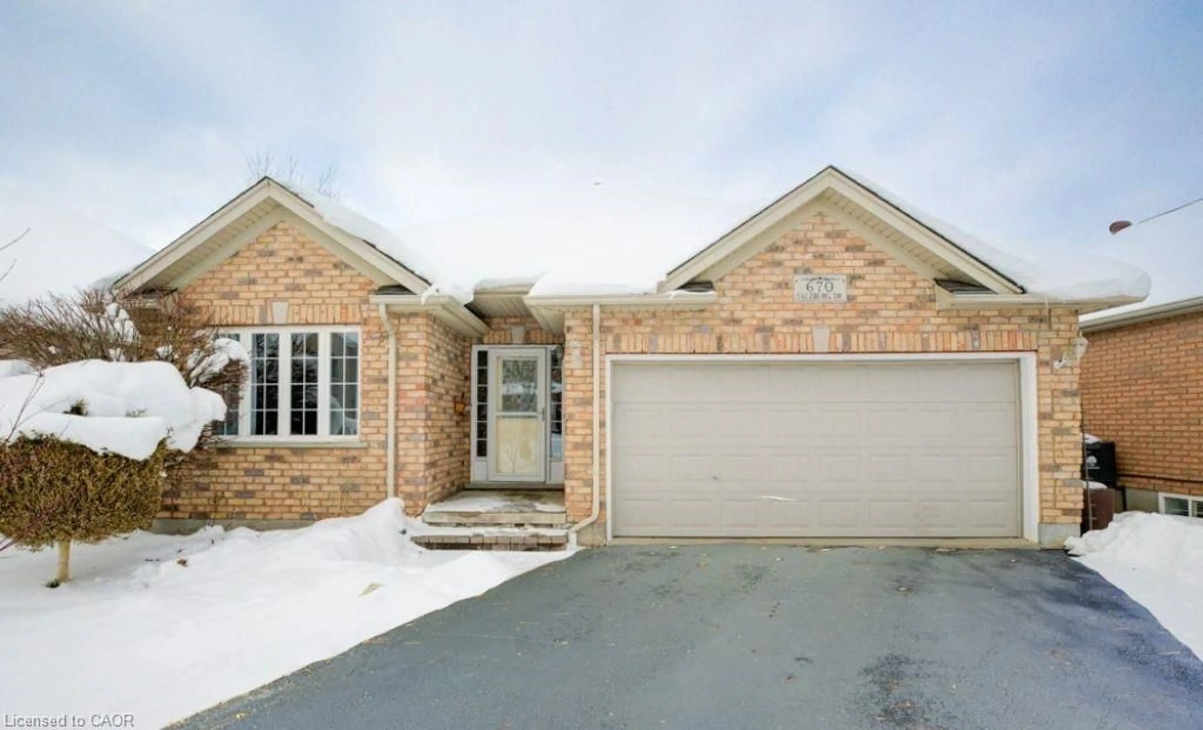 Home with brick exterior material, street for 670 Salzburg Dr, Waterloo Ontario N2V 2N8