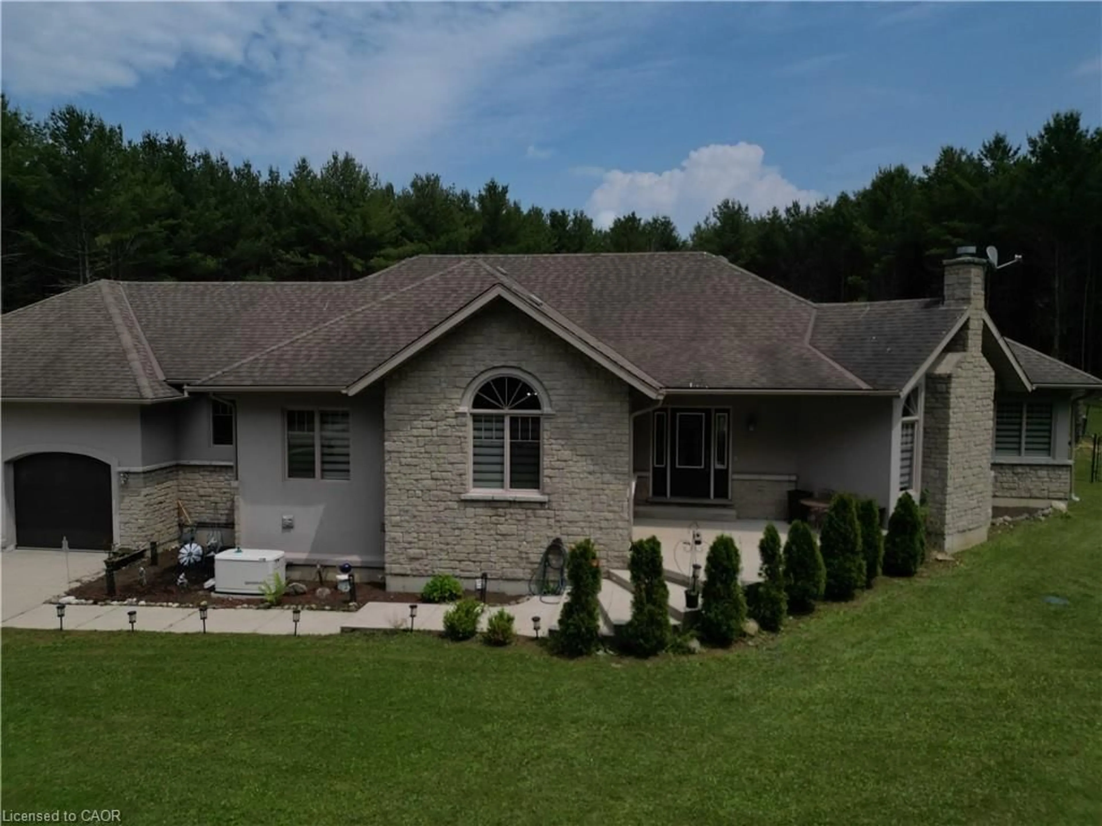 A pic from outside/outdoor area/front of a property/back of a property/a pic from drone, unknown for 230 South Water St, Mount Forest Ontario N0G 2L3