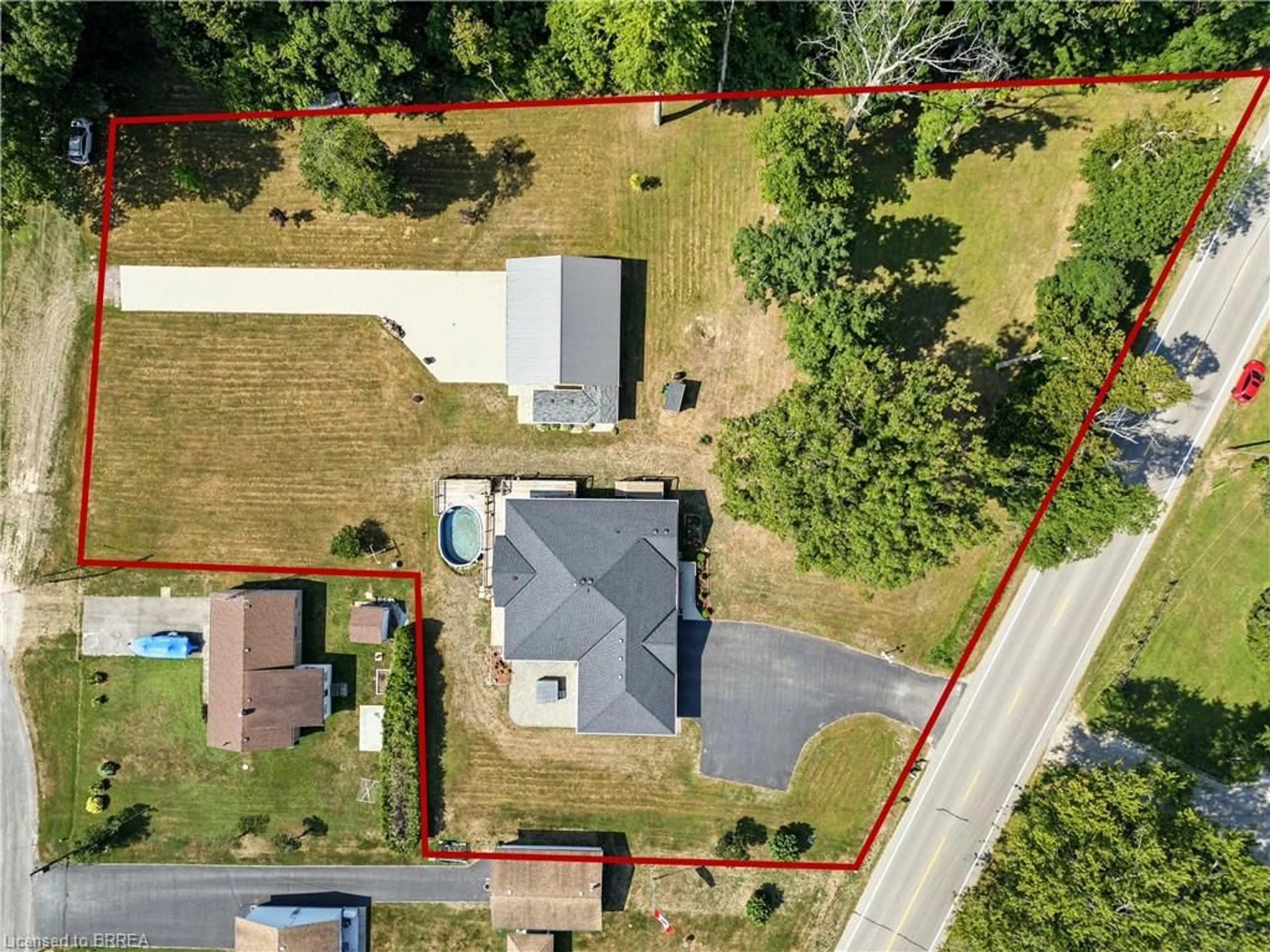 A pic from outside/outdoor area/front of a property/back of a property/a pic from drone, street for 1026 Front Rd, St. Williams Ontario N0E 1P0