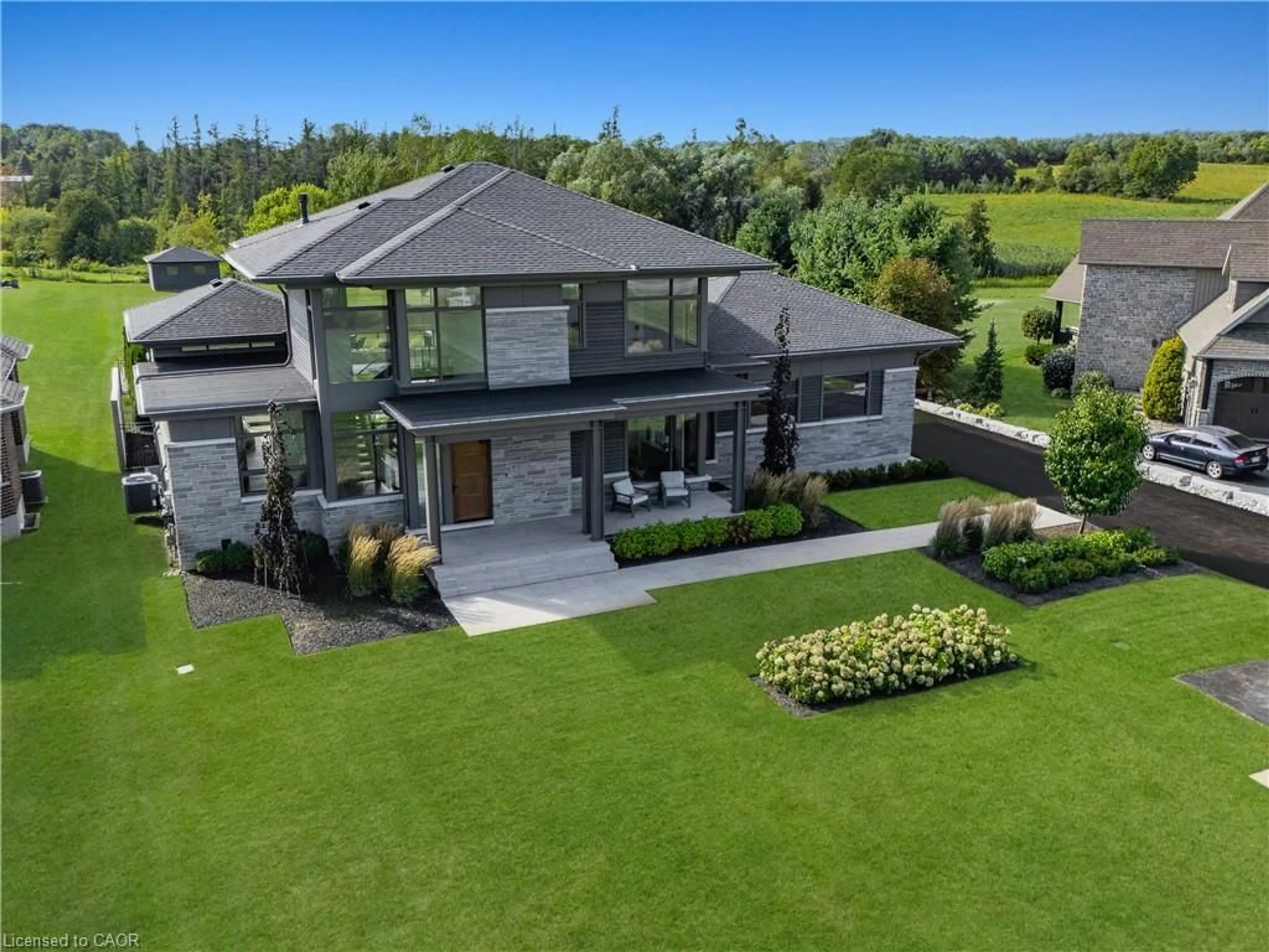 A pic from outside/outdoor area/front of a property/back of a property/a pic from drone, unknown for 1826 Moser Young Rd, Wellesley Ontario N0B 2T0