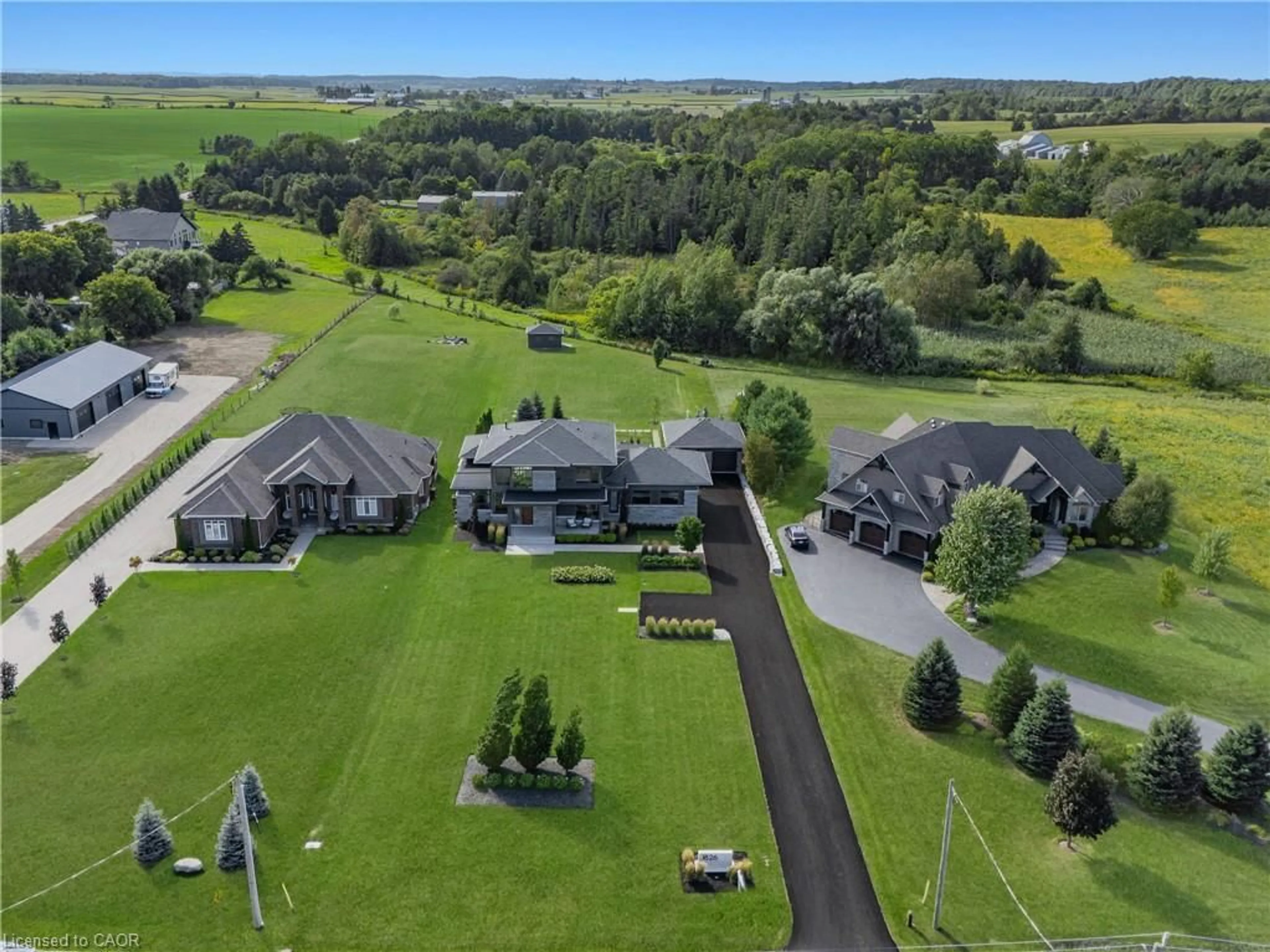 A pic from outside/outdoor area/front of a property/back of a property/a pic from drone, mountain view for 1826 Moser Young Rd, Wellesley Ontario N0B 2T0