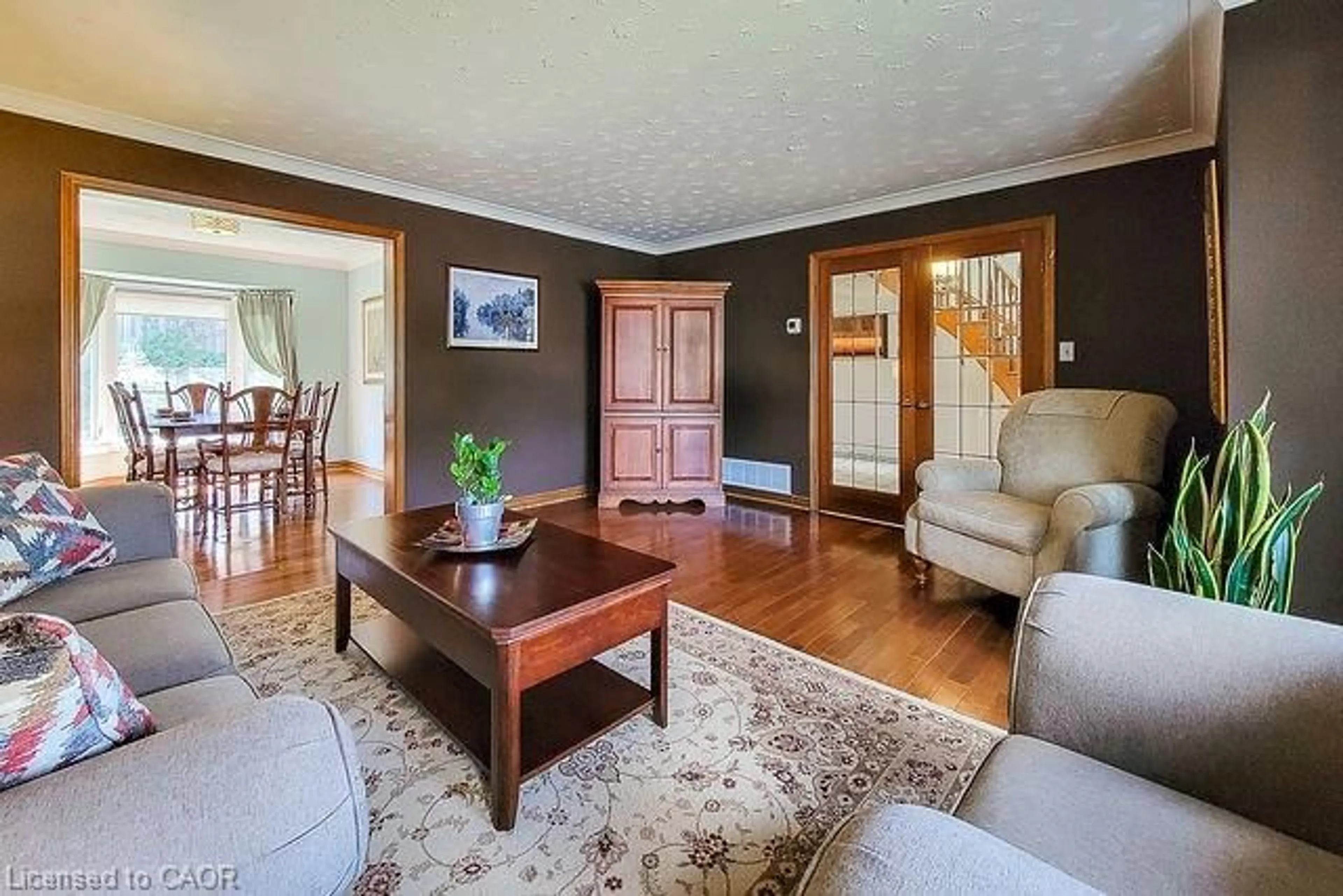 Living room with furniture, wood/laminate floor for 369 Haller Pl, Haldimand County Ontario N3W 1E2