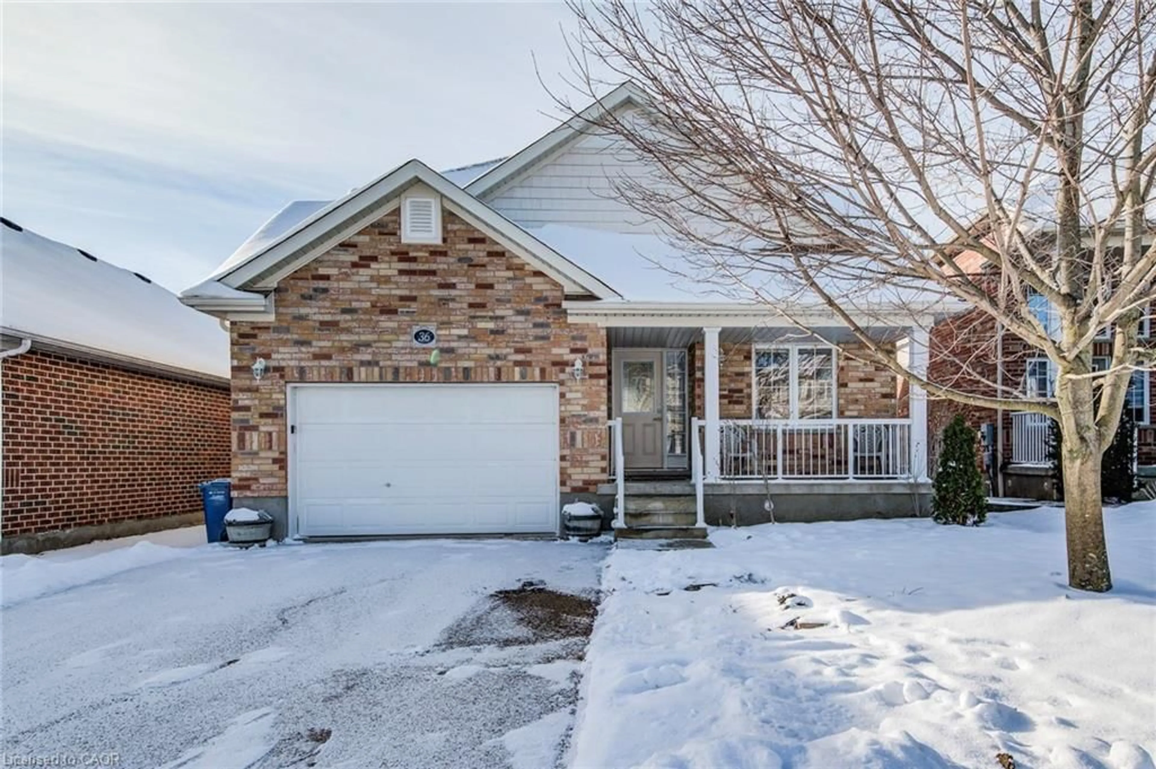Home with brick exterior material, street for 36 Washburn Dr, Guelph Ontario N1E 0B6
