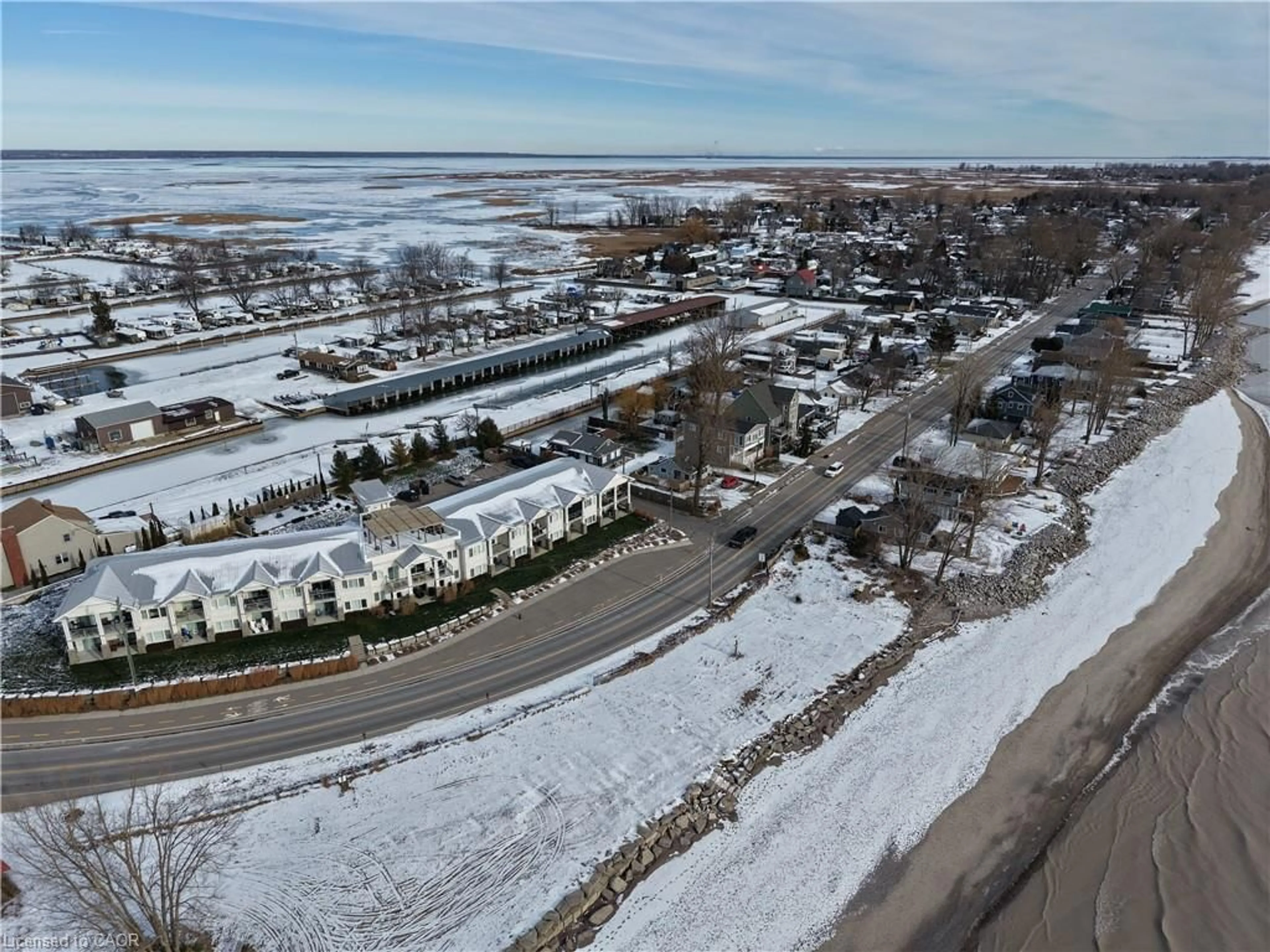 A pic from outside/outdoor area/front of a property/back of a property/a pic from drone, street for 12 Erie Blvd #203, Port Rowan Ontario N0E 1M0