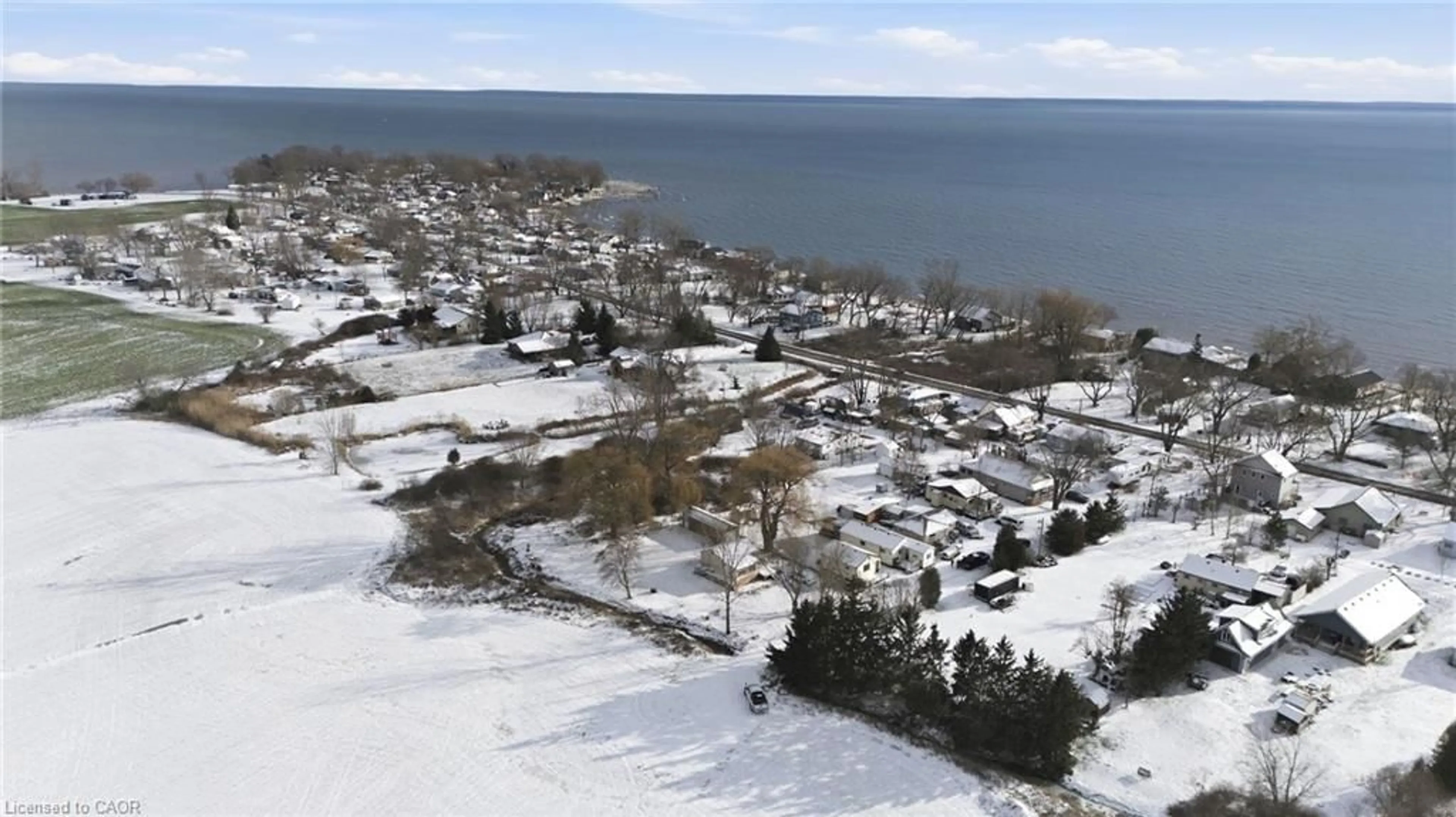 A pic from outside/outdoor area/front of a property/back of a property/a pic from drone, water/lake/river/ocean view for 16 Birch Lane, Selkirk Ontario N0A 1P0