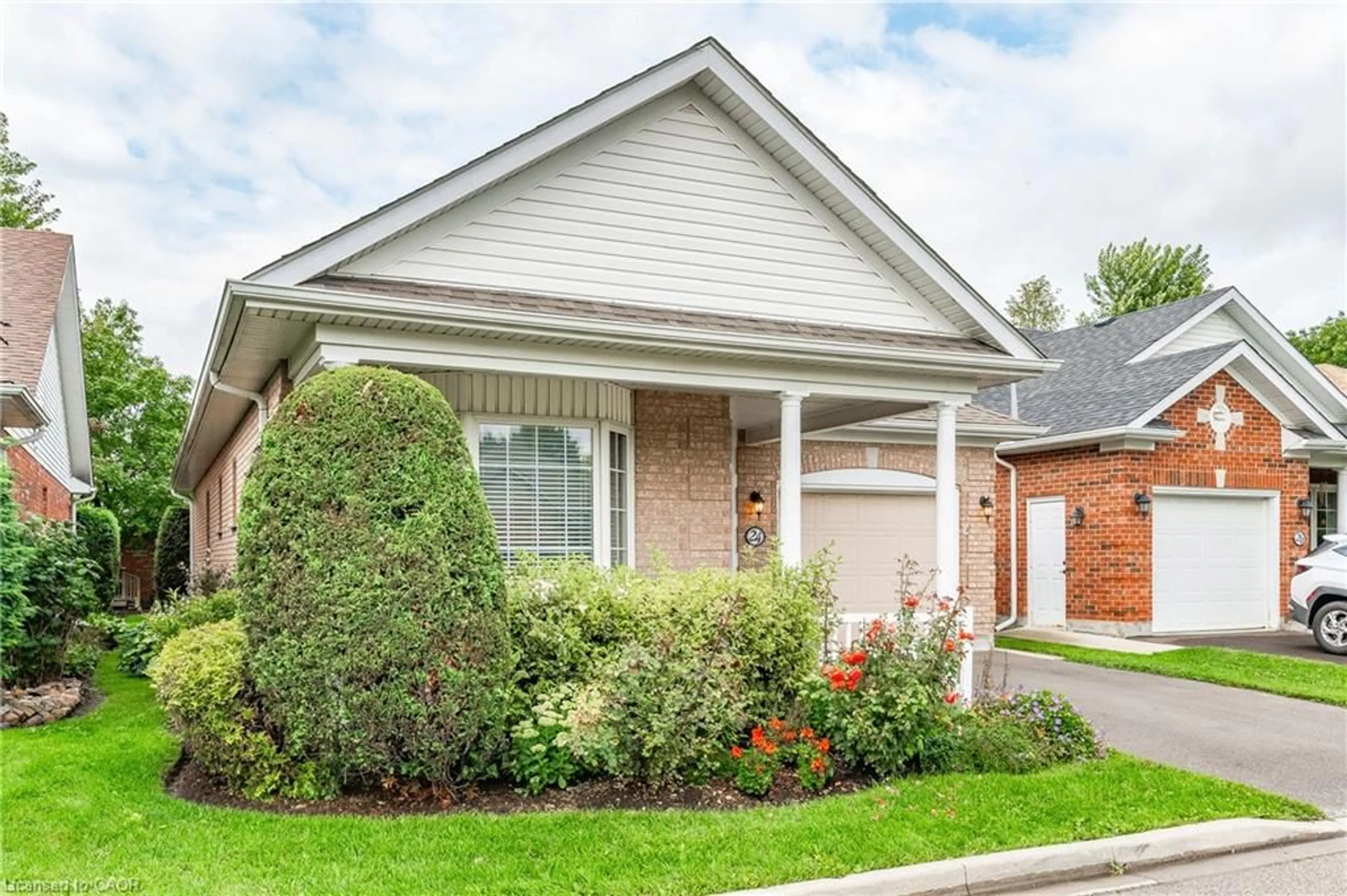 Home with brick exterior material, street for 24 Beechlawn Blvd, Guelph Ontario N1G 4X7