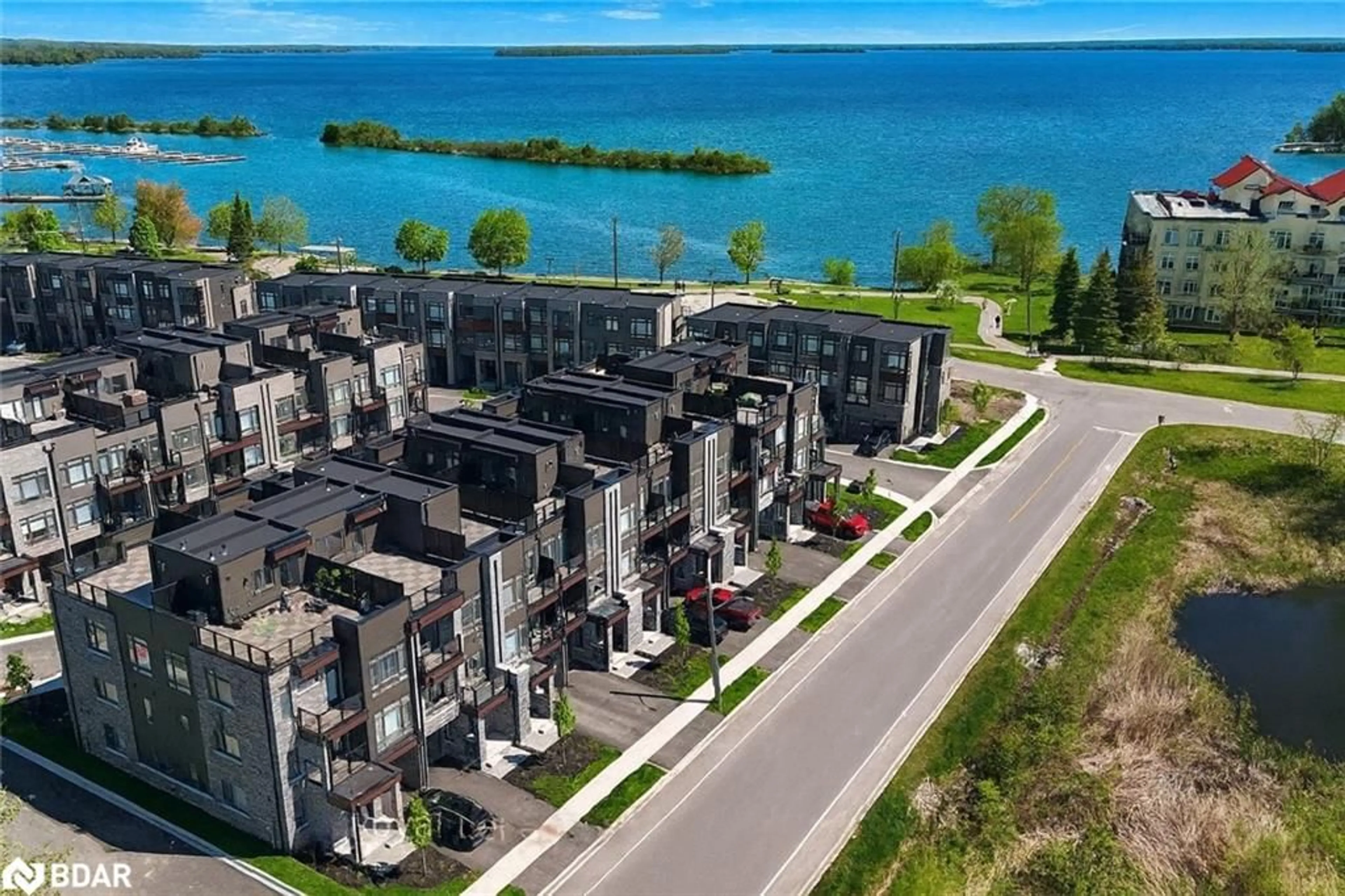 A pic from outside/outdoor area/front of a property/back of a property/a pic from drone, water/lake/river/ocean view for 158 Elgin St, Orillia Ontario L3V 8P7