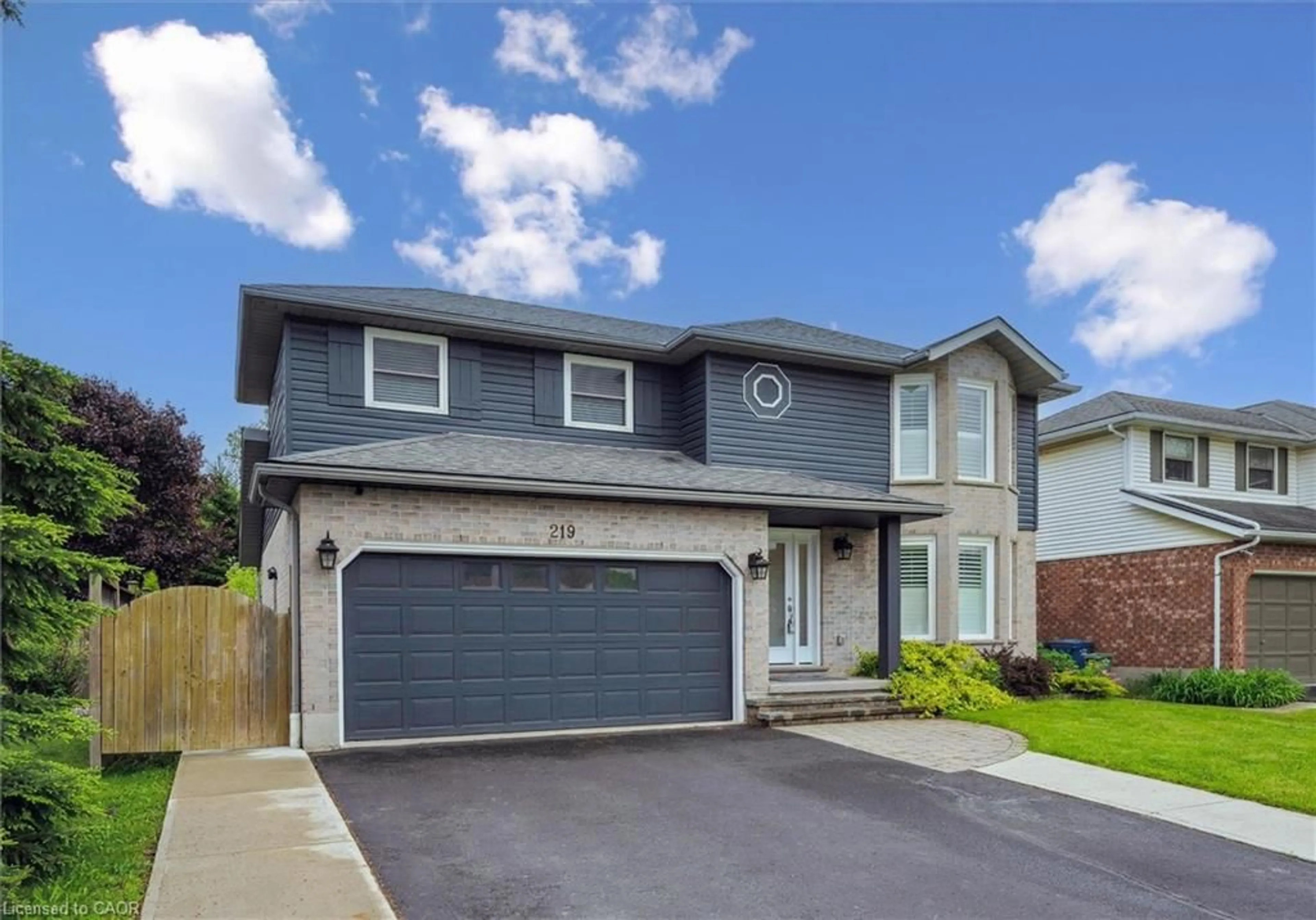 Home with vinyl exterior material, street for 219 Elmira Rd, Guelph Ontario N1K 1R1