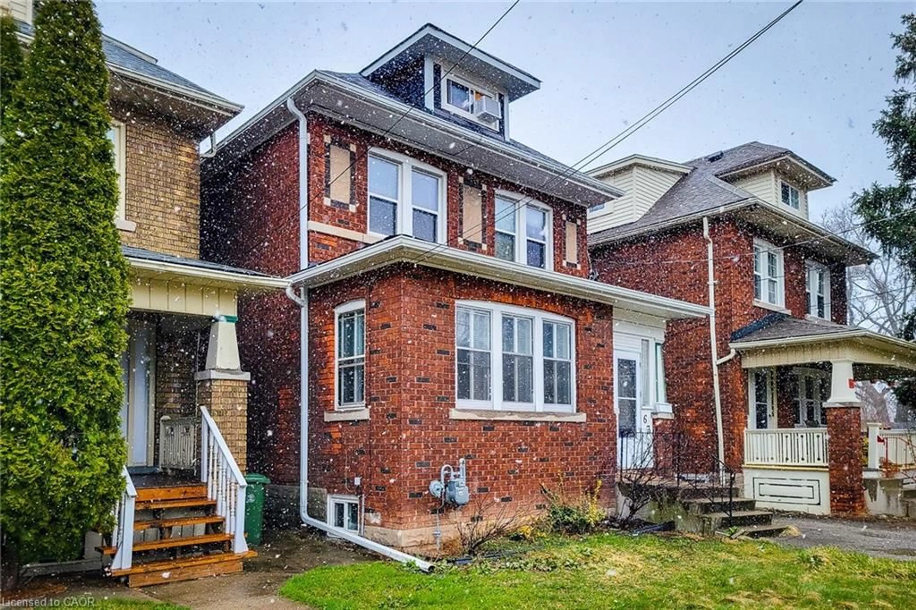 Home with brick exterior material, street for 63 Paisley Ave, Hamilton Ontario L8S 1V2