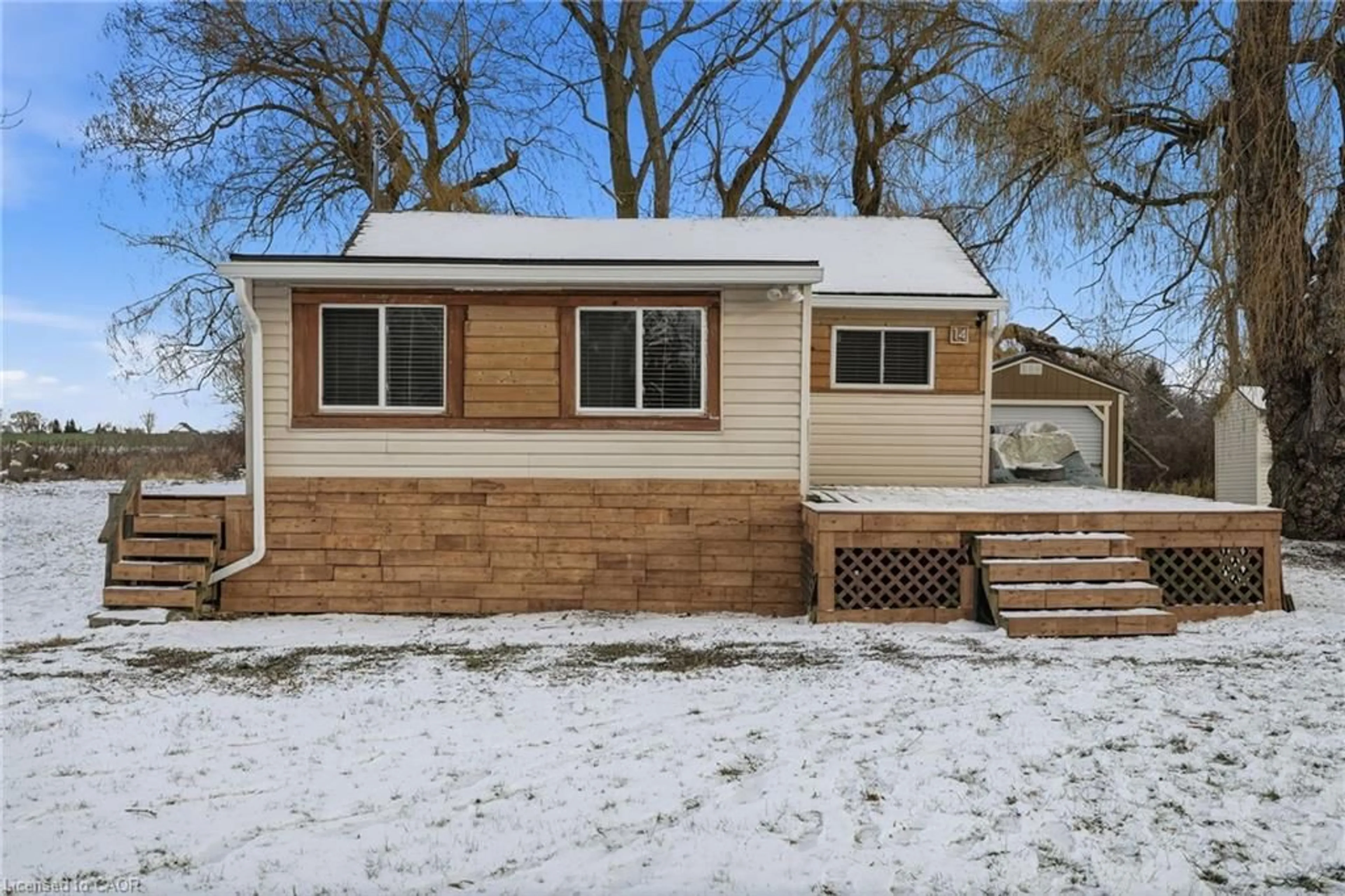 Home with vinyl exterior material, street for 14 Birch Lane, Selkirk Ontario N0A 1P0