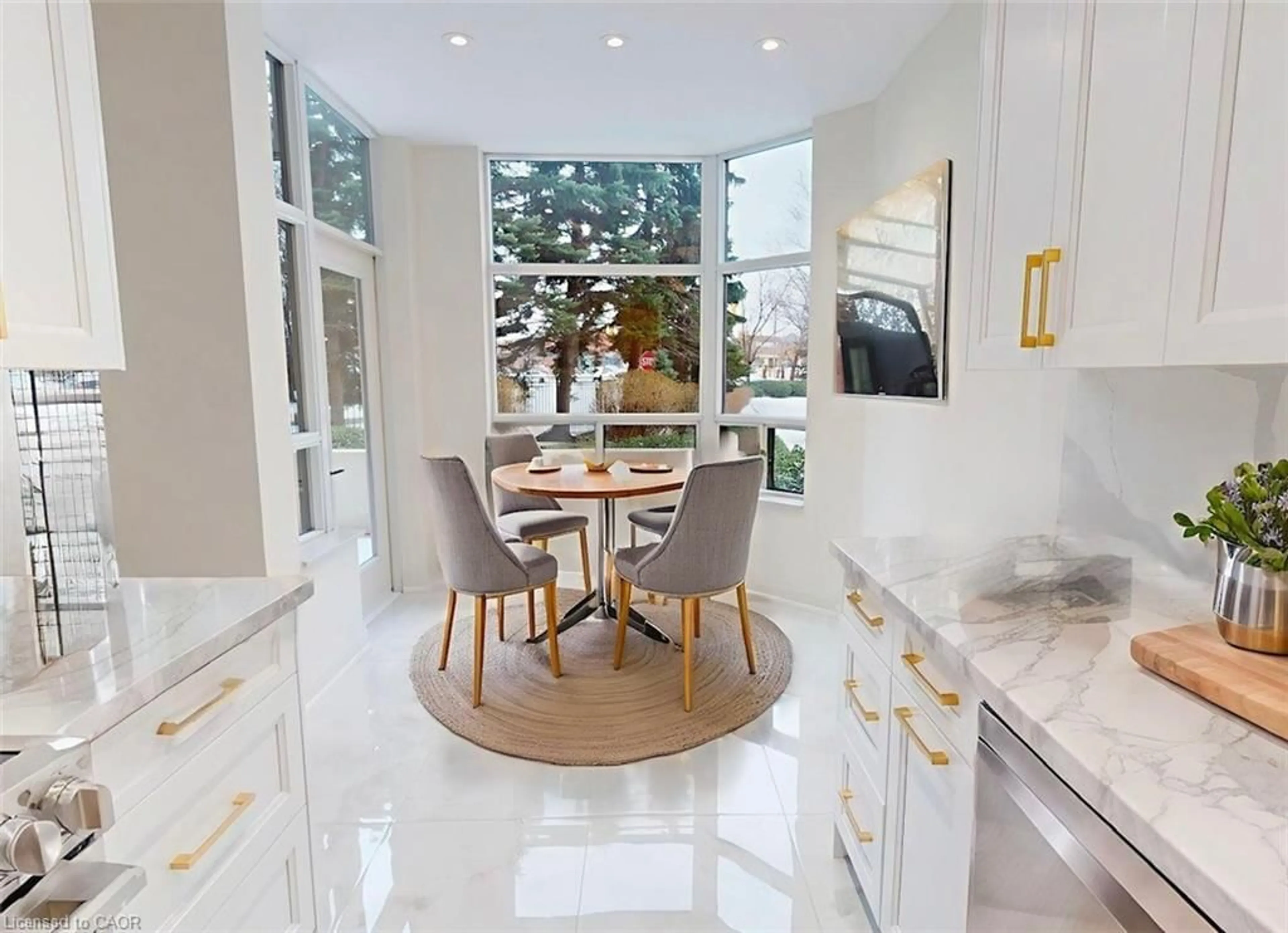 Contemporary kitchen, ceramic/tile floor for 35 Kingsbridge Garden Cir #105, Mississauga Ontario L5R 3Z5