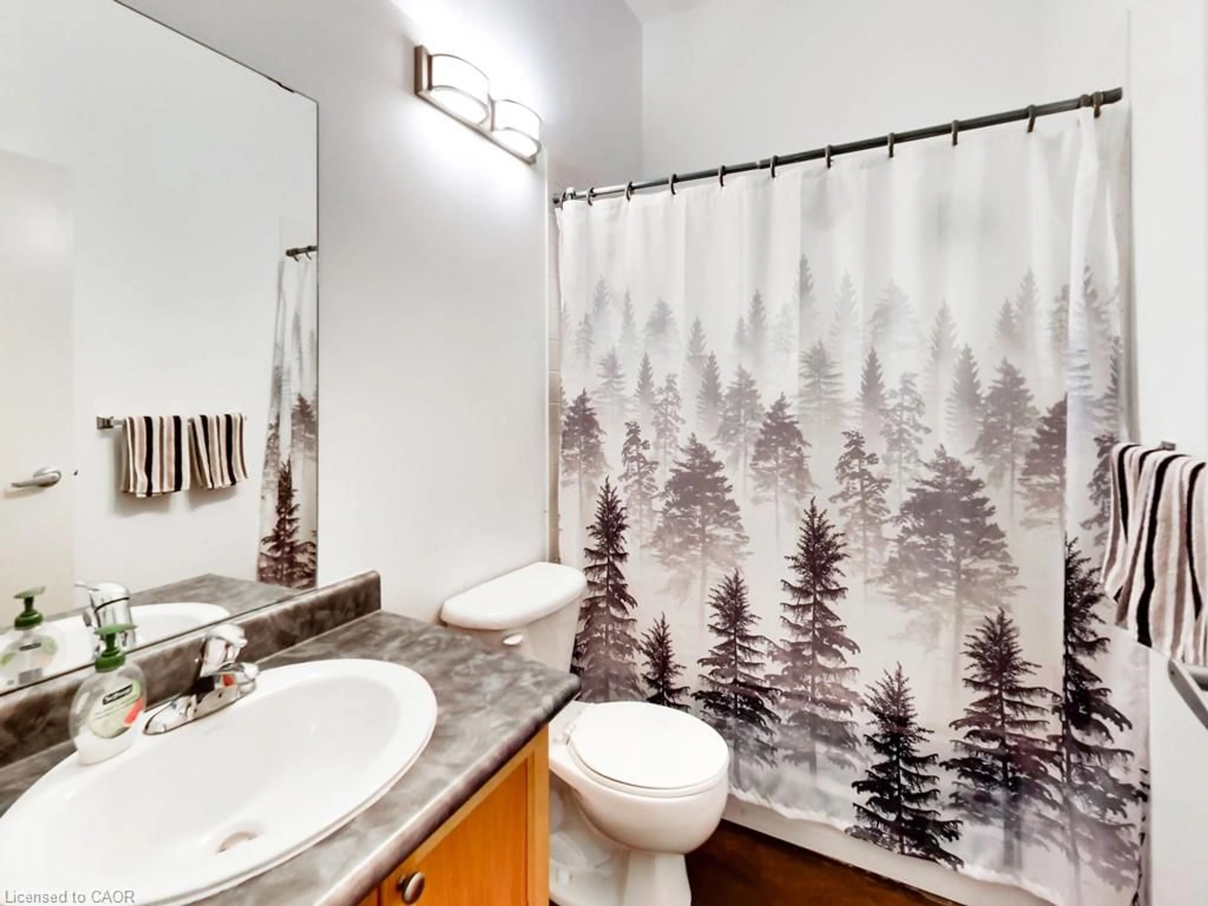 Standard bathroom, ceramic/tile floor for 11 Rebecca St #307, Hamilton Ontario L8R 3H7