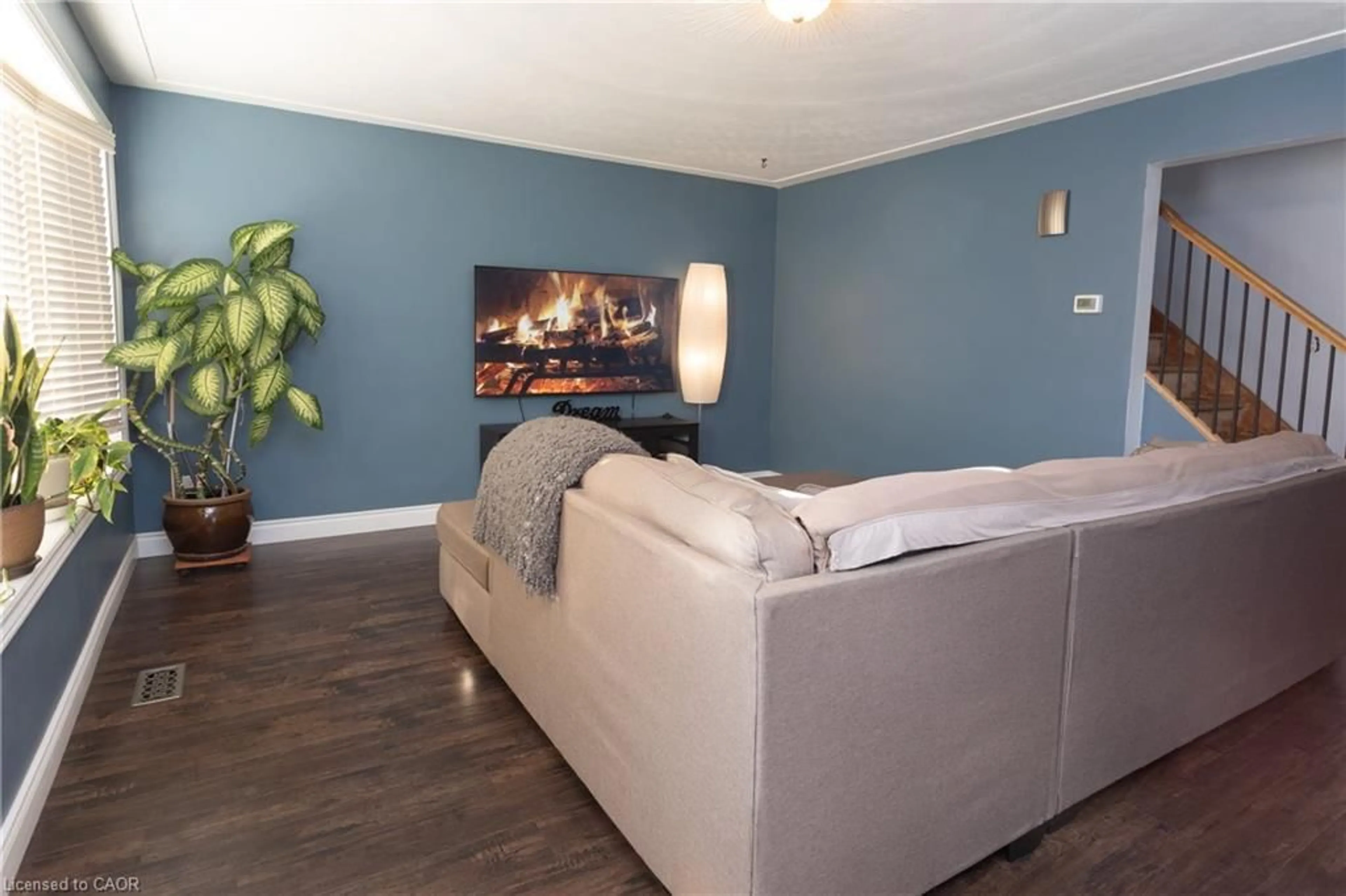 Living room with furniture, wood/laminate floor for 22 Shea Cres, Kitchener Ontario N2E 1E8