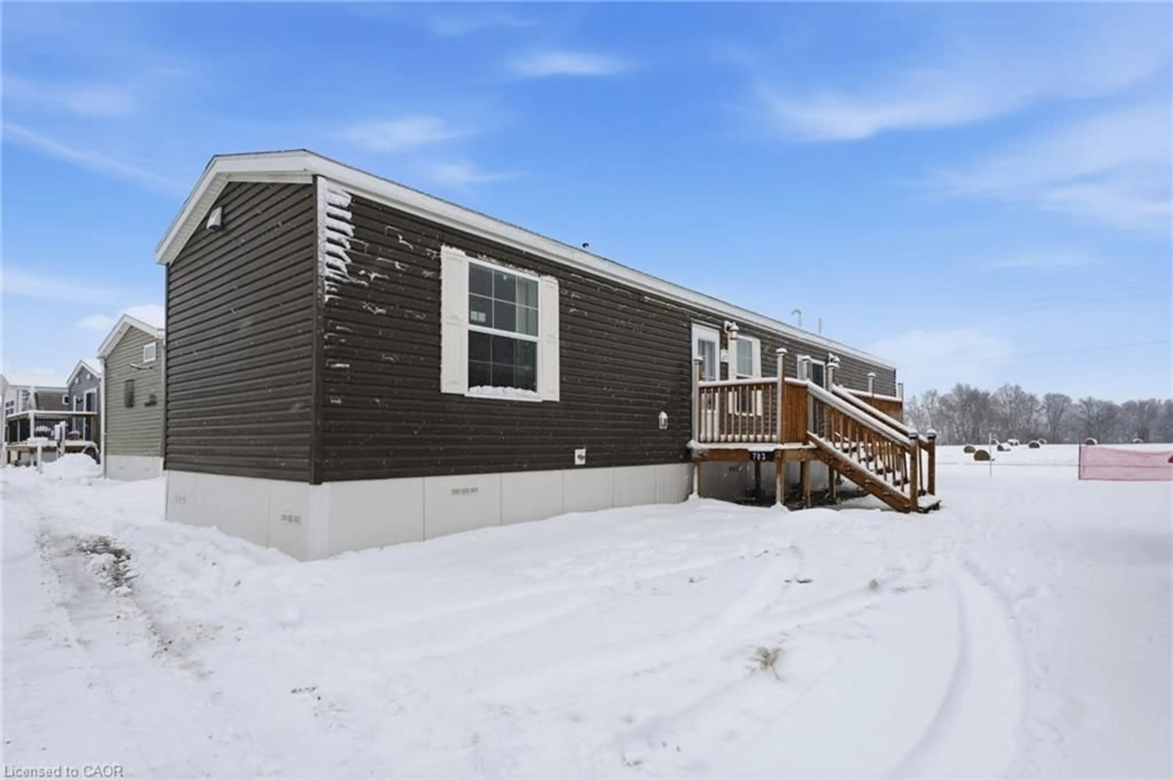 Home with vinyl exterior material, street for 99 Fourth Concession Rd #703, Burford Ontario N0E 1A0