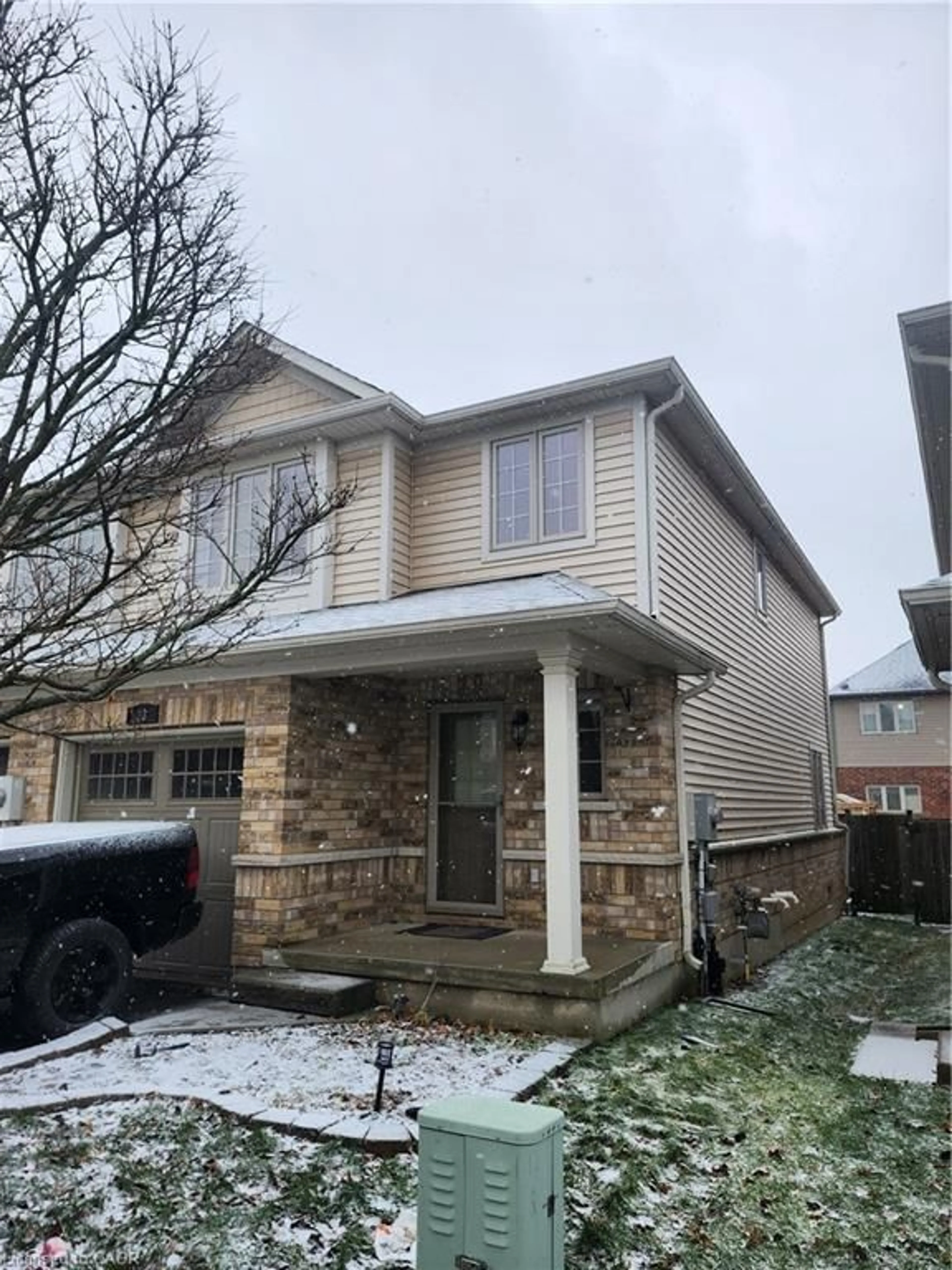 Home with brick exterior material, street for 222 Fall Fair Way #23, Binbrook Ontario L0R 1C0