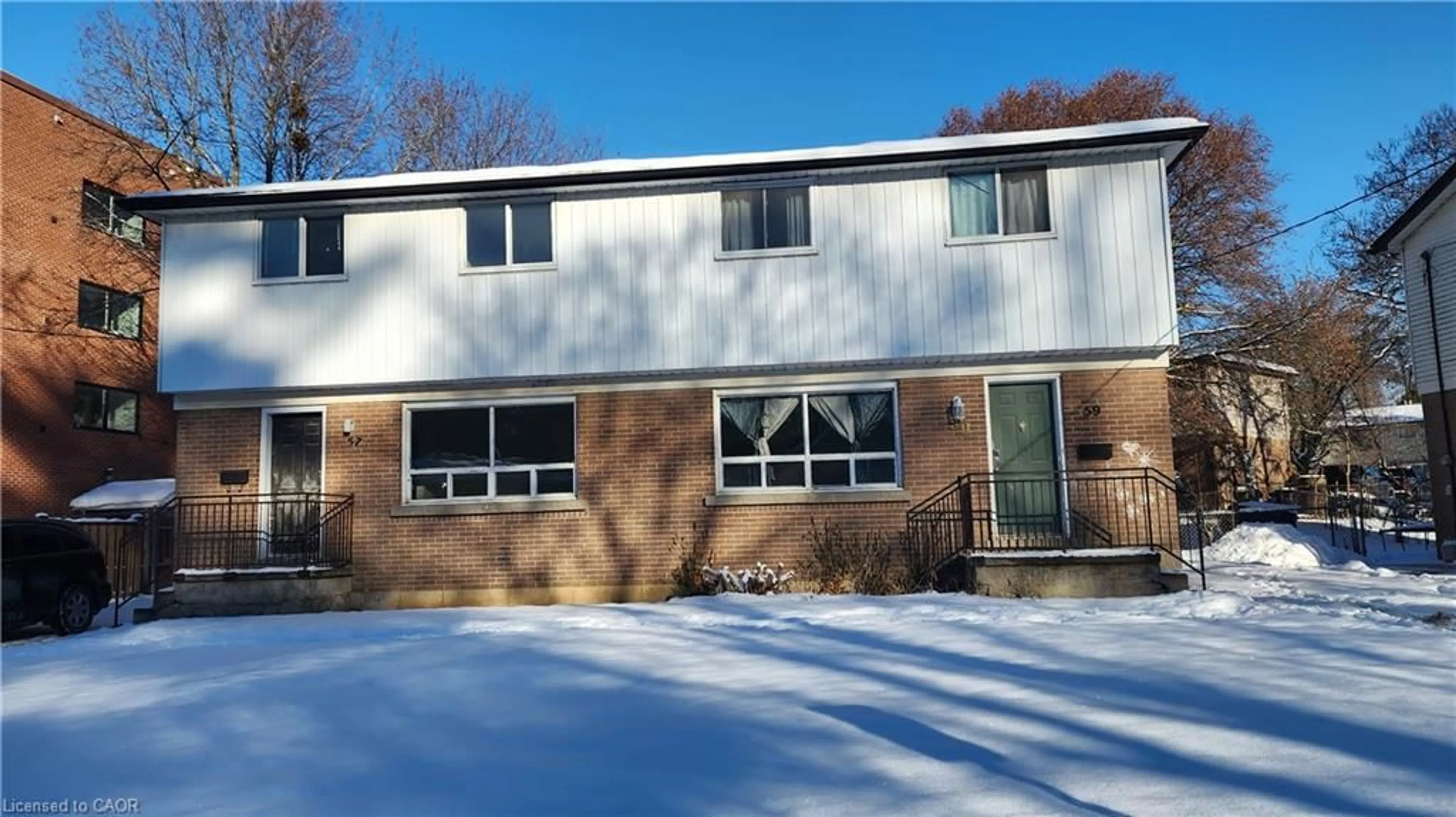 Home with brick exterior material, unknown for 57-59 Oakwood Ave, Simcoe Ontario N3Y 1H6