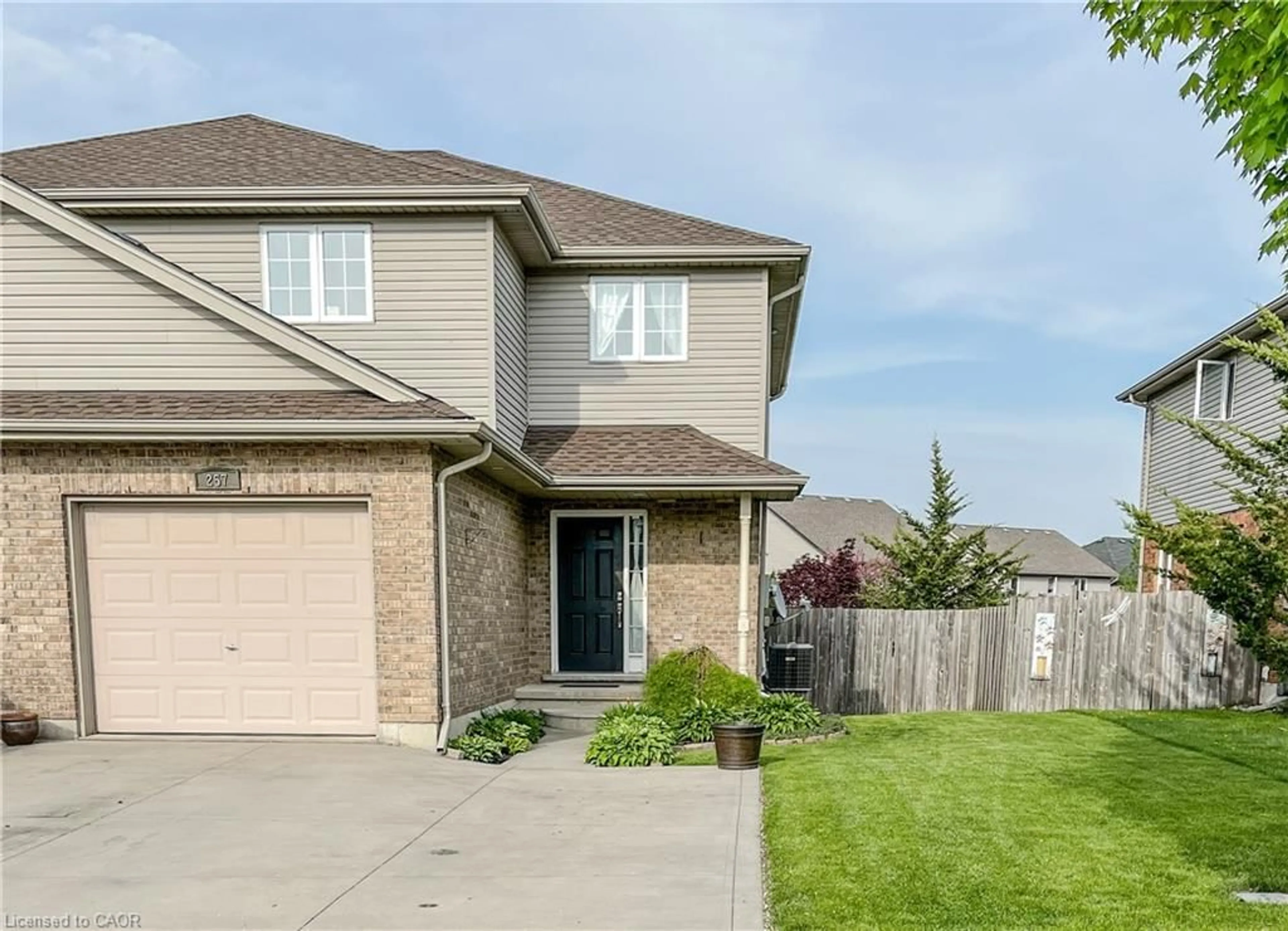 Home with brick exterior material, street for 257 Falcon Dr, Woodstock Ontario N4T 0A1