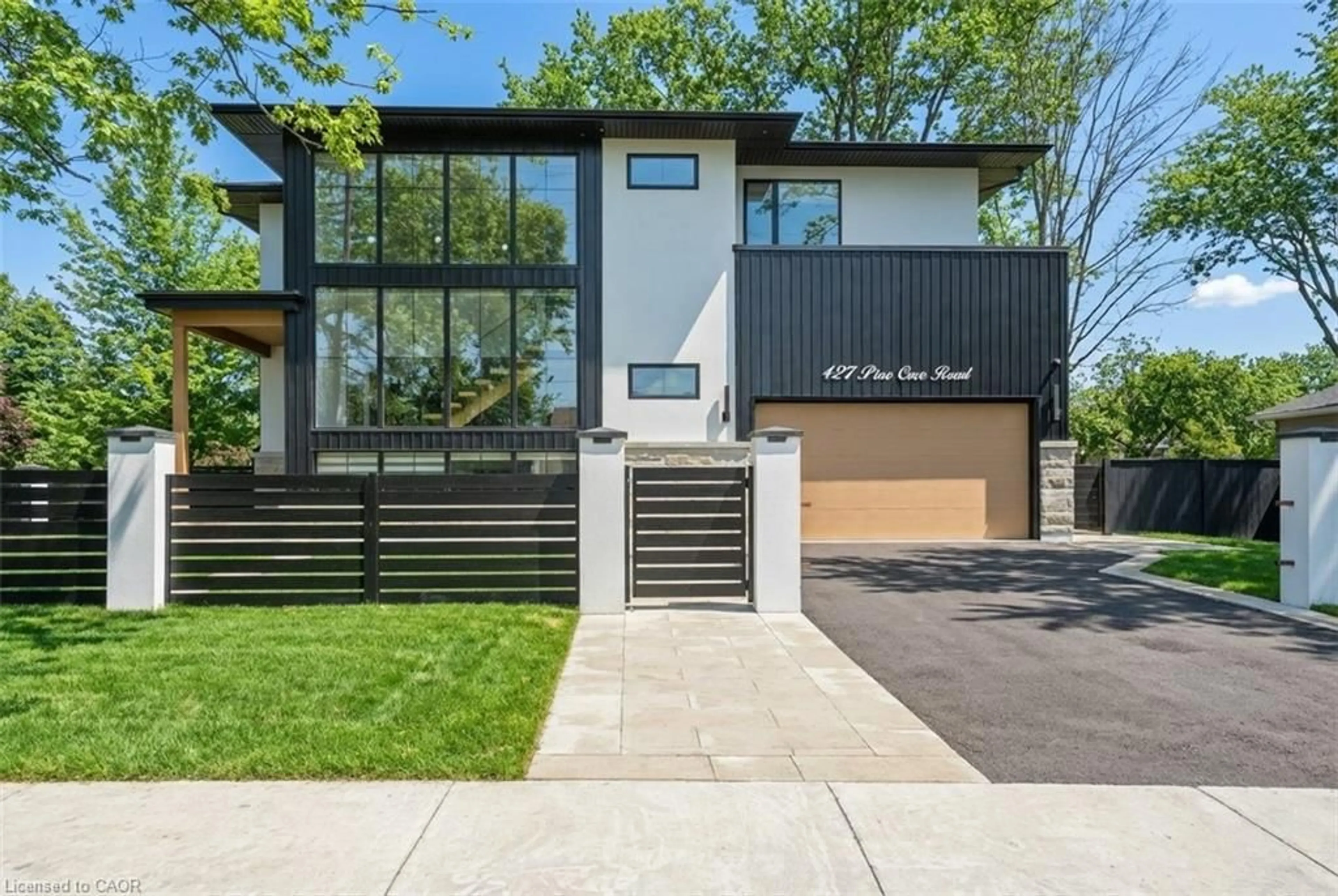 Home with brick exterior material, street for 427 Pine Cove Rd, Burlington Ontario L7N 1W4